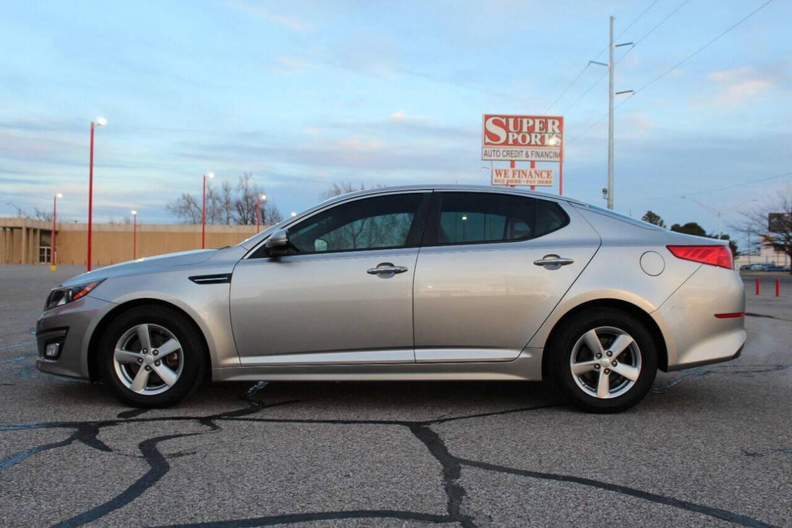 2015 Silver Kia Optima LX (5XXGM4A76FG) with an 2.4L L4 DOHC 16V engine, 6-Speed Automatic transmission, located at 4301 NW 39th , Oklahoma City, OK, 73112, (405) 949-5600, 35.512135, -97.598671 - NO DRIVERS LICENCE NO-FULL COVERAGE INSURANCE-NO CREDIT CHECK. COME ON OVER TO SUPERSPORTS AND TAKE A LOOK AND TEST DRIVE. PLEASE GIVE US A CALL AT (405) 949-5600. NO LICENSIA DE MANEJAR- NO SEGURO DE COBERTURA TOTAL- NO VERIFICACCION DE CREDITO. POR FAVOR VENGAN A SUPERSPORTS, ECHE UN - Photo#2