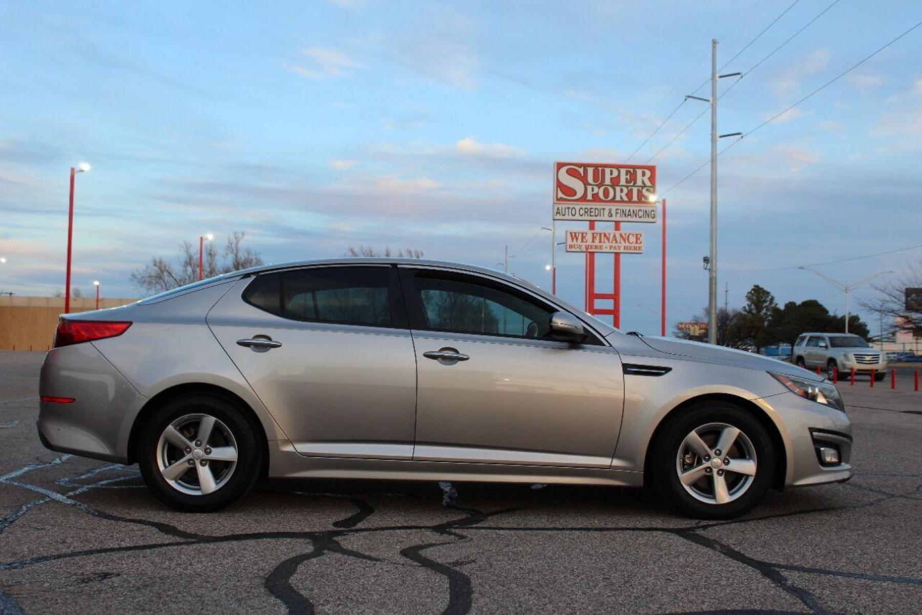 2015 Silver Kia Optima (5XXGM4A76FG) with an 2.4L I4 2.4L I4 engine, Automatic 6-Speed transmission, located at 4301 NW 39th , Oklahoma City, OK, 73112, (405) 949-5600, 35.512135, -97.598671 - NO DRIVERS LICENCE NO-FULL COVERAGE INSURANCE-NO CREDIT CHECK. COME ON OVER TO SUPERSPORTS AND TAKE A LOOK AND TEST DRIVE PLEASE GIVE US A CALL AT (405) 949-5600. NO LICENSIA DE MANEJAR- NO SEGURO DE COBERTURA TOTAL- NO VERIFICACCION DE CREDITO. POR FAVOR VENGAN A SUPERSPORTS, E - Photo #4