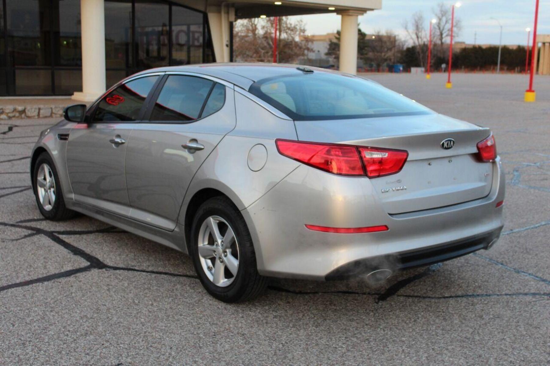 2015 Silver Kia Optima (5XXGM4A76FG) with an 2.4L I4 2.4L I4 engine, Automatic 6-Speed transmission, located at 4301 NW 39th , Oklahoma City, OK, 73112, (405) 949-5600, 35.512135, -97.598671 - NO DRIVERS LICENCE NO-FULL COVERAGE INSURANCE-NO CREDIT CHECK. COME ON OVER TO SUPERSPORTS AND TAKE A LOOK AND TEST DRIVE PLEASE GIVE US A CALL AT (405) 949-5600. NO LICENSIA DE MANEJAR- NO SEGURO DE COBERTURA TOTAL- NO VERIFICACCION DE CREDITO. POR FAVOR VENGAN A SUPERSPORTS, E - Photo #6