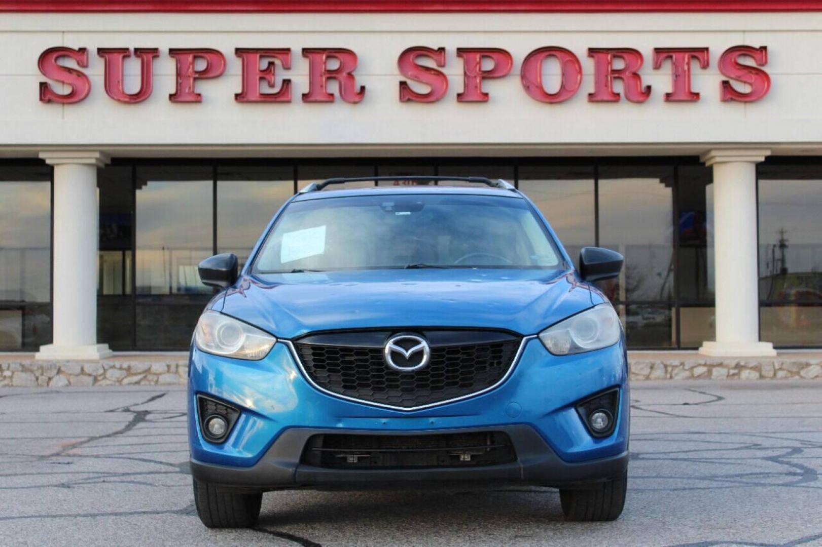 2014 Blue Mazda CX-5 Grand Touring (JM3KE2DY0E0) with an 2.5L L4 DOHC 16V engine, 6-Speed Automatic transmission, located at 4301 NW 39th , Oklahoma City, OK, 73112, (405) 949-5600, 35.512135, -97.598671 - Photo#2