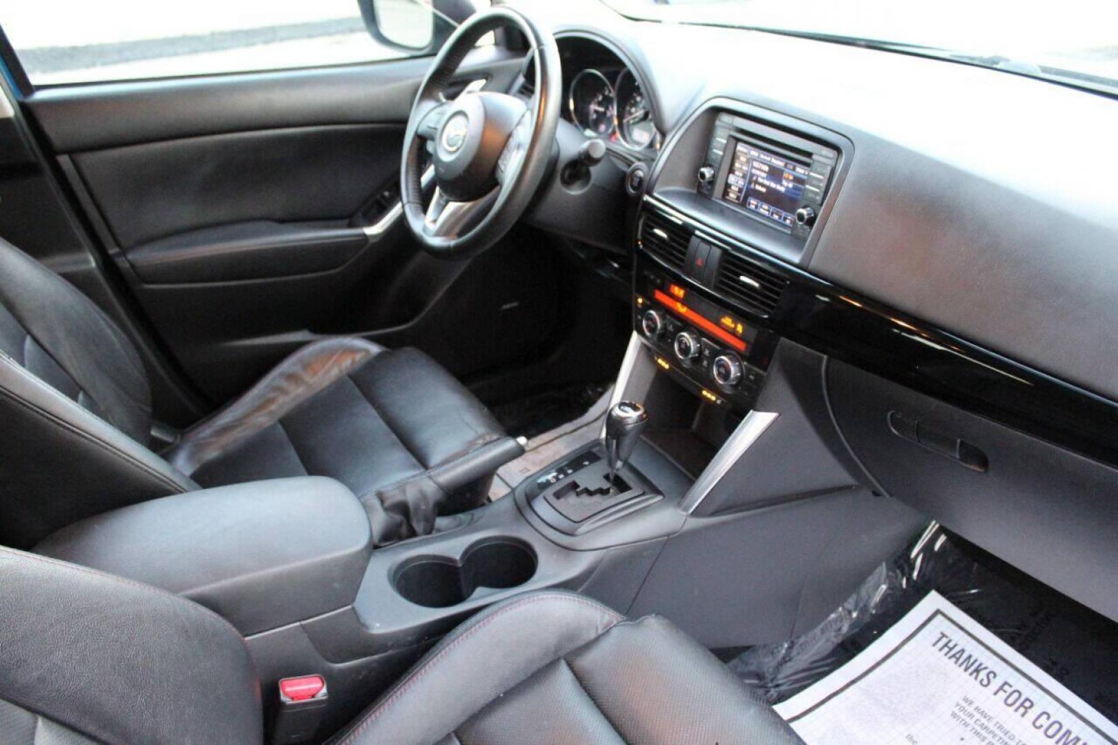 2014 Blue Mazda CX-5 Grand Touring (JM3KE2DY0E0) with an 2.5L L4 DOHC 16V engine, 6-Speed Automatic transmission, located at 4301 NW 39th , Oklahoma City, OK, 73112, (405) 949-5600, 35.512135, -97.598671 - Photo#8
