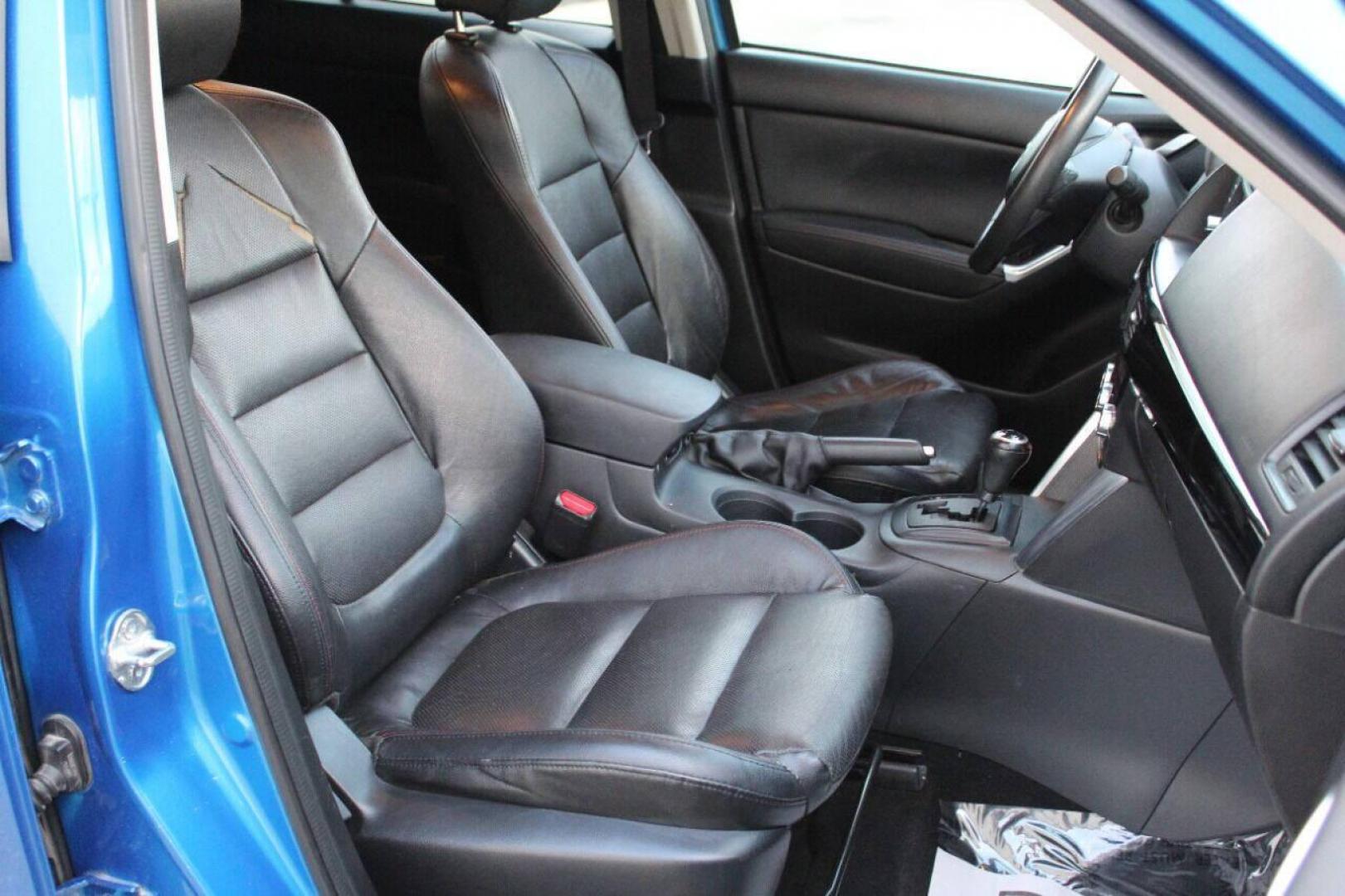 2014 Blue Mazda CX-5 Grand Touring (JM3KE2DY0E0) with an 2.5L L4 DOHC 16V engine, 6-Speed Automatic transmission, located at 4301 NW 39th , Oklahoma City, OK, 73112, (405) 949-5600, 35.512135, -97.598671 - Photo#10