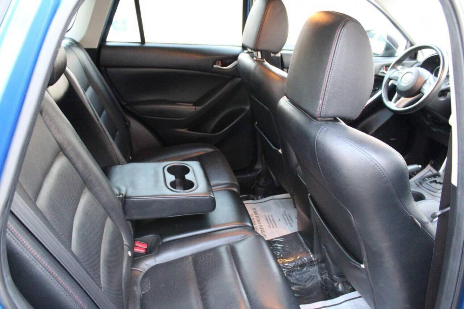 2014 Blue Mazda CX-5 Grand Touring (JM3KE2DY0E0) with an 2.5L L4 DOHC 16V engine, 6-Speed Automatic transmission, located at 4301 NW 39th , Oklahoma City, OK, 73112, (405) 949-5600, 35.512135, -97.598671 - Photo#11