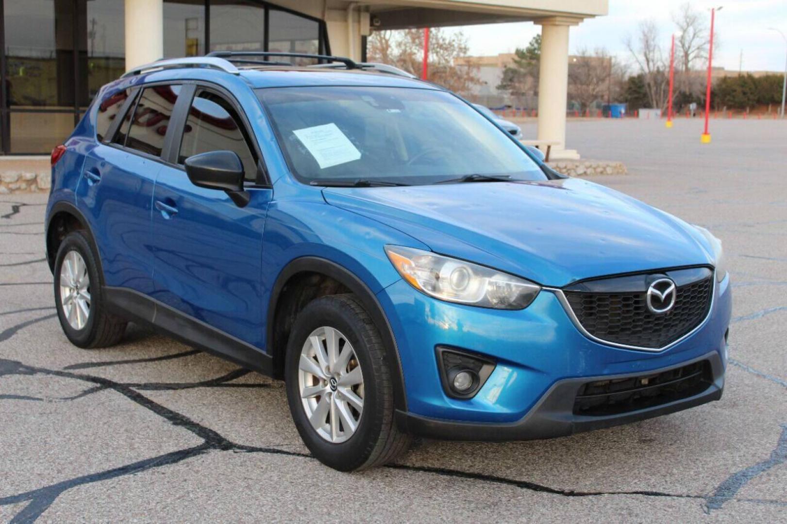 2014 Blue Mazda CX-5 Grand Touring (JM3KE2DY0E0) with an 2.5L L4 DOHC 16V engine, 6-Speed Automatic transmission, located at 4301 NW 39th , Oklahoma City, OK, 73112, (405) 949-5600, 35.512135, -97.598671 - Photo#0