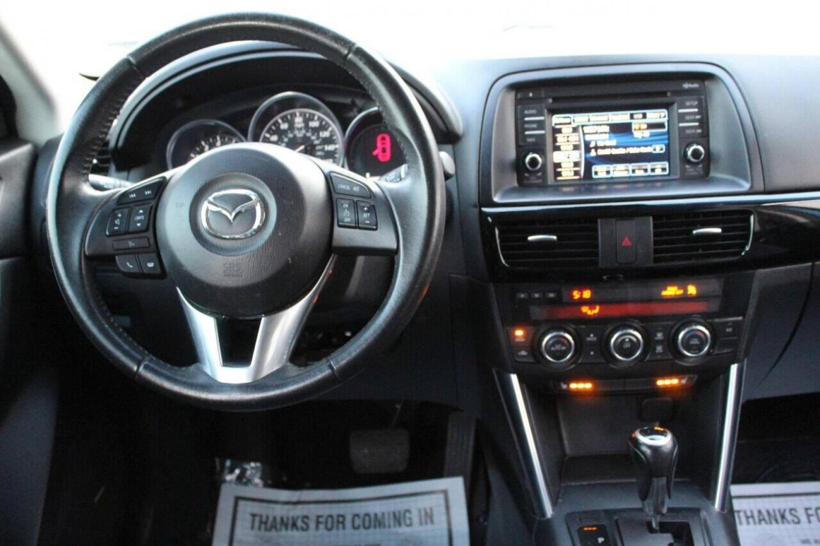 2014 Blue Mazda CX-5 Grand Touring (JM3KE2DY0E0) with an 2.5L L4 DOHC 16V engine, 6-Speed Automatic transmission, located at 4301 NW 39th , Oklahoma City, OK, 73112, (405) 949-5600, 35.512135, -97.598671 - Photo#18
