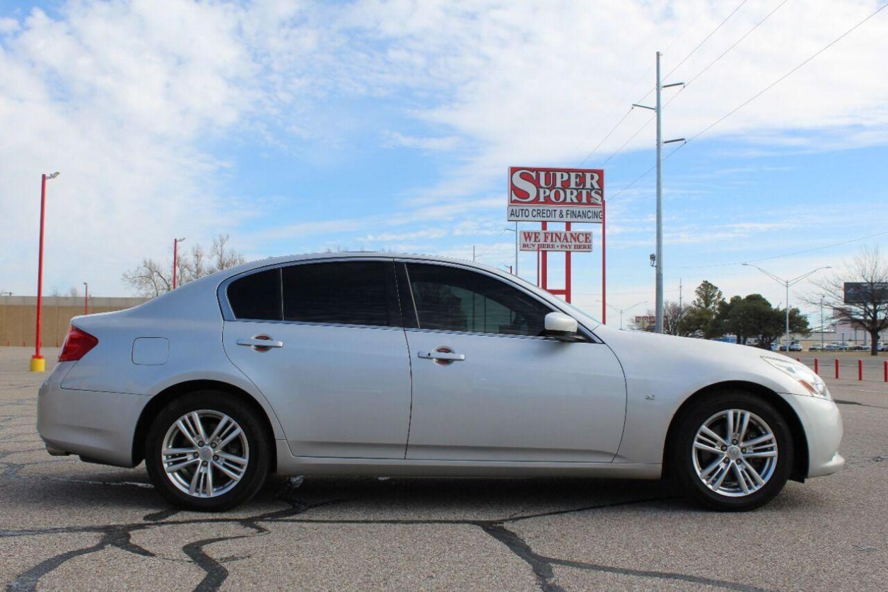 2015 Silver Infiniti Q40 (JN1CV6AR2FM) with an 3.7L V6 3.7L V6 engine, Automatic 7-Speed transmission, located at 4301 NW 39th , Oklahoma City, OK, 73112, (405) 949-5600, 35.512135, -97.598671 - NO DRIVERS LICENCE NO-FULL COVERAGE INSURANCE-NO CREDIT CHECK. COME ON OVER TO SUPERSPORTS AND TAKE A LOOK AND TEST DRIVE PLEASE GIVE US A CALL AT (405) 949-5600. NO LICENSIA DE MANEJAR- NO SEGURO DE COBERTURA TOTAL- NO VERIFICACCION DE CREDITO. POR FAVOR VENGAN A SUPERSPORTS, E - Photo #3