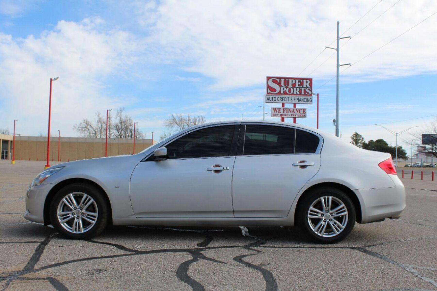 2015 Silver Infiniti Q40 (JN1CV6AR2FM) with an 3.7L V6 3.7L V6 engine, Automatic 7-Speed transmission, located at 4301 NW 39th , Oklahoma City, OK, 73112, (405) 949-5600, 35.512135, -97.598671 - NO DRIVERS LICENCE NO-FULL COVERAGE INSURANCE-NO CREDIT CHECK. COME ON OVER TO SUPERSPORTS AND TAKE A LOOK AND TEST DRIVE PLEASE GIVE US A CALL AT (405) 949-5600. NO LICENSIA DE MANEJAR- NO SEGURO DE COBERTURA TOTAL- NO VERIFICACCION DE CREDITO. POR FAVOR VENGAN A SUPERSPORTS, E - Photo #6