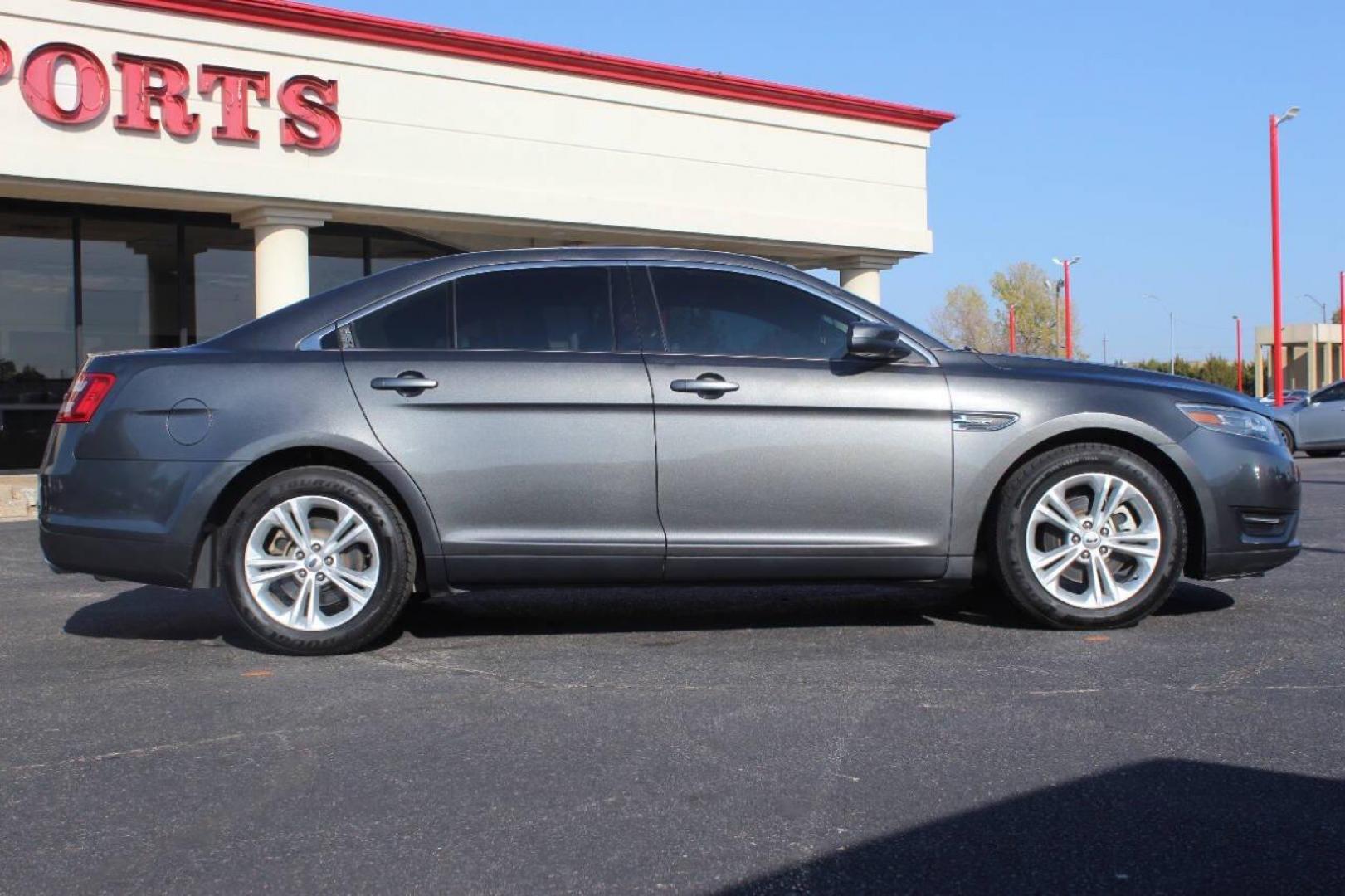 2015 Gray Ford Taurus SEL FWD (1FAHP2E86FG) with an 3.5L V6 DOHC 24V engine, 6-Speed Automatic transmission, located at 4301 NW 39th , Oklahoma City, OK, 73112, (405) 949-5600, 35.512135, -97.598671 - NO DRIVERS LICENCE NO-FULL COVERAGE INSURANCE-NO CREDIT CHECK. COME ON OVER TO SUPERSPORTS AND TAKE A LOOK AND TEST DRIVE. PLEASE GIVE US A CALL AT (405) 949-5600. NO LICENSIA DE MANEJAR- NO SEGURO DE COBERTURA TOTAL- NO VERIFICACCION DE CREDITO. POR FAVOR VENGAN A SUPERSPORTS, ECHE UN - Photo#3