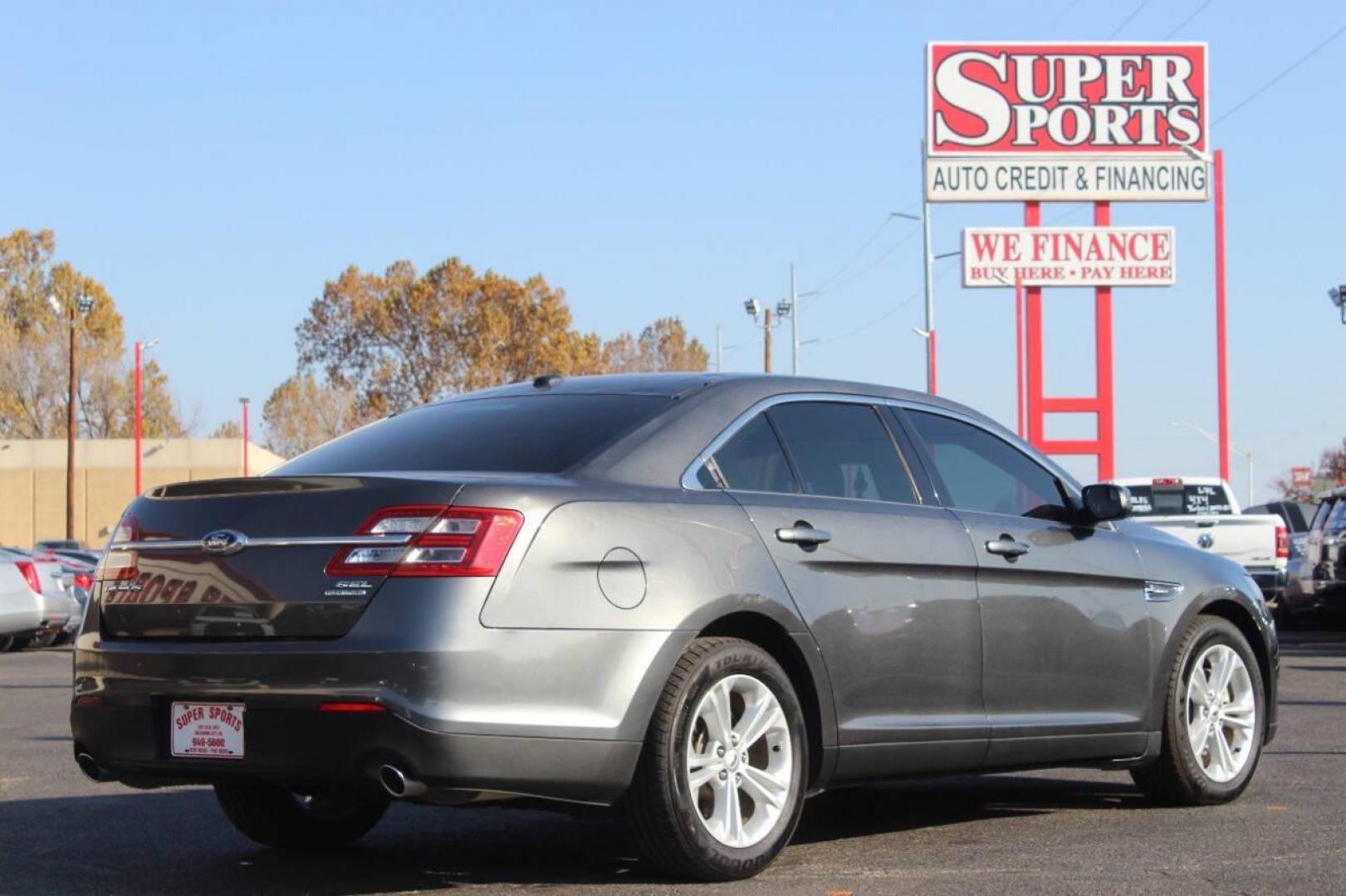 2015 Gray Ford Taurus SEL FWD (1FAHP2E86FG) with an 3.5L V6 DOHC 24V engine, 6-Speed Automatic transmission, located at 4301 NW 39th , Oklahoma City, OK, 73112, (405) 949-5600, 35.512135, -97.598671 - NO DRIVERS LICENCE NO-FULL COVERAGE INSURANCE-NO CREDIT CHECK. COME ON OVER TO SUPERSPORTS AND TAKE A LOOK AND TEST DRIVE. PLEASE GIVE US A CALL AT (405) 949-5600. NO LICENSIA DE MANEJAR- NO SEGURO DE COBERTURA TOTAL- NO VERIFICACCION DE CREDITO. POR FAVOR VENGAN A SUPERSPORTS, ECHE UN - Photo#4