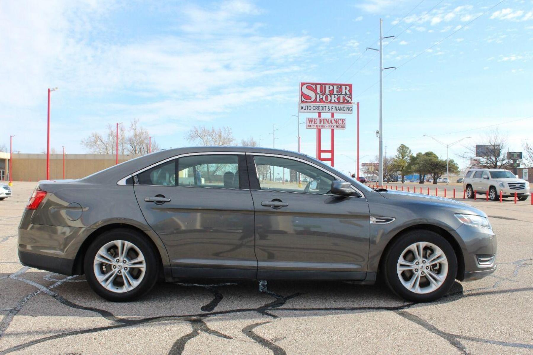 2015 Gray Ford Taurus (1FAHP2E86FG) with an 3.5L V6 3.5L V6 engine, Automatic 6-Speed transmission, located at 4301 NW 39th , Oklahoma City, OK, 73112, (405) 949-5600, 35.512135, -97.598671 - NO DRIVERS LICENCE NO-FULL COVERAGE INSURANCE-NO CREDIT CHECK. COME ON OVER TO SUPERSPORTS AND TAKE A LOOK AND TEST DRIVE PLEASE GIVE US A CALL AT (405) 949-5600. NO LICENSIA DE MANEJAR- NO SEGURO DE COBERTURA TOTAL- NO VERIFICACCION DE CREDITO. POR FAVOR VENGAN A SUPERSPORTS, E - Photo #0