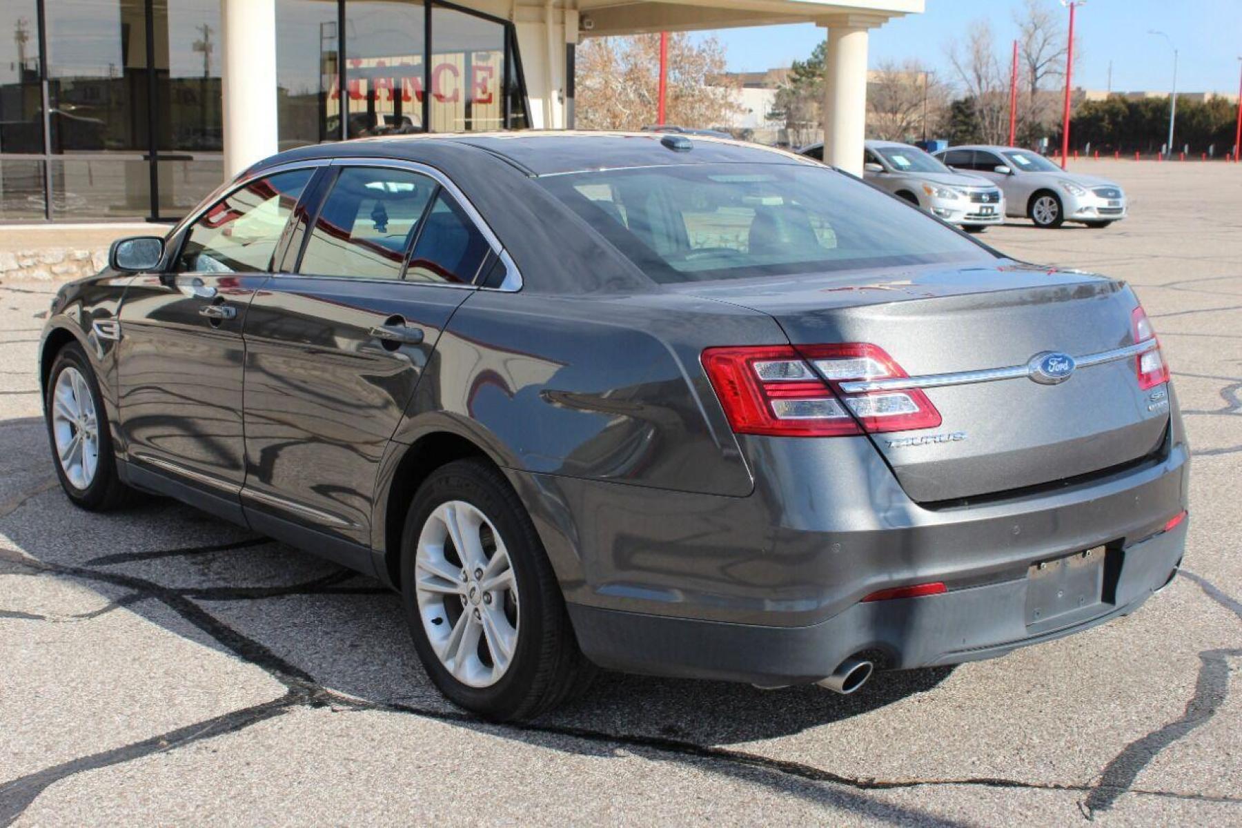 2015 Gray Ford Taurus (1FAHP2E86FG) with an 3.5L V6 3.5L V6 engine, Automatic 6-Speed transmission, located at 4301 NW 39th , Oklahoma City, OK, 73112, (405) 949-5600, 35.512135, -97.598671 - NO DRIVERS LICENCE NO-FULL COVERAGE INSURANCE-NO CREDIT CHECK. COME ON OVER TO SUPERSPORTS AND TAKE A LOOK AND TEST DRIVE PLEASE GIVE US A CALL AT (405) 949-5600. NO LICENSIA DE MANEJAR- NO SEGURO DE COBERTURA TOTAL- NO VERIFICACCION DE CREDITO. POR FAVOR VENGAN A SUPERSPORTS, E - Photo #3