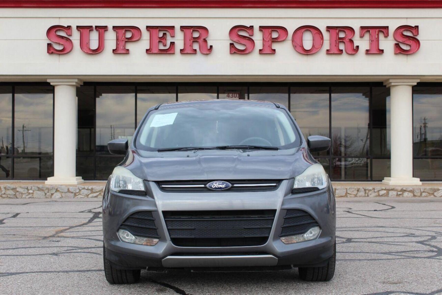 2014 Gray Ford Escape (1FMCU0GX4EU) with an 1.6L I4 Turbocharger 1.6L I4 engine, Automatic 6-Speed transmission, located at 4301 NW 39th , Oklahoma City, OK, 73112, (405) 949-5600, 35.512135, -97.598671 - NO DRIVERS LICENCE NO-FULL COVERAGE INSURANCE-NO CREDIT CHECK. COME ON OVER TO SUPERSPORTS AND TAKE A LOOK AND TEST DRIVE PLEASE GIVE US A CALL AT (405) 949-5600. NO LICENSIA DE MANEJAR- NO SEGURO DE COBERTURA TOTAL- NO VERIFICACCION DE CREDITO. POR FAVOR VENGAN A SUPERSPORTS, E - Photo #0