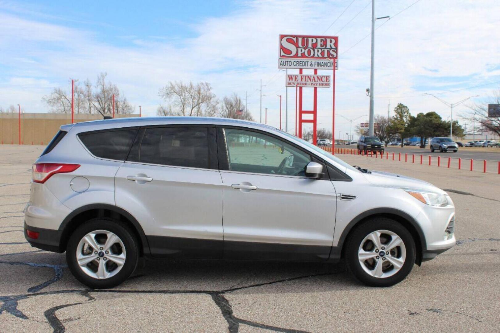 2014 Silver Ford Escape SE FWD (1FMCU0GX3EU) with an 1.6L L4 DOHC 16V engine, 6-Speed Automatic transmission, located at 4301 NW 39th , Oklahoma City, OK, 73112, (405) 949-5600, 35.512135, -97.598671 - NO DRIVERS LICENCE NO-FULL COVERAGE INSURANCE-NO CREDIT CHECK. COME ON OVER TO SUPERSPORTS AND TAKE A LOOK AND TEST DRIVE. PLEASE GIVE US A CALL AT (405) 949-5600. NO LICENSIA DE MANEJAR- NO SEGURO DE COBERTURA TOTAL- NO VERIFICACCION DE CREDITO. POR FAVOR VENGAN A SUPERSPORTS, ECHE UN - Photo#3