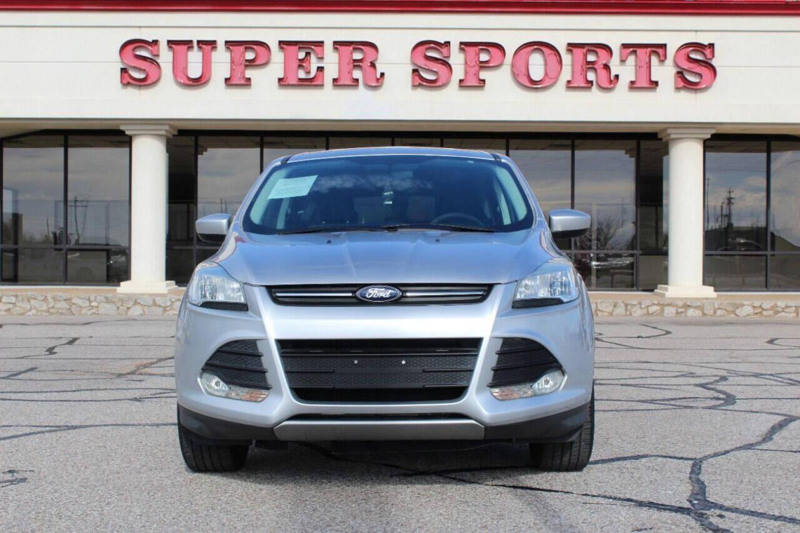 2014 Silver Ford Escape SE FWD (1FMCU0GX3EU) with an 1.6L L4 DOHC 16V engine, 6-Speed Automatic transmission, located at 4301 NW 39th , Oklahoma City, OK, 73112, (405) 949-5600, 35.512135, -97.598671 - NO DRIVERS LICENCE NO-FULL COVERAGE INSURANCE-NO CREDIT CHECK. COME ON OVER TO SUPERSPORTS AND TAKE A LOOK AND TEST DRIVE. PLEASE GIVE US A CALL AT (405) 949-5600. NO LICENSIA DE MANEJAR- NO SEGURO DE COBERTURA TOTAL- NO VERIFICACCION DE CREDITO. POR FAVOR VENGAN A SUPERSPORTS, ECHE UN - Photo#2