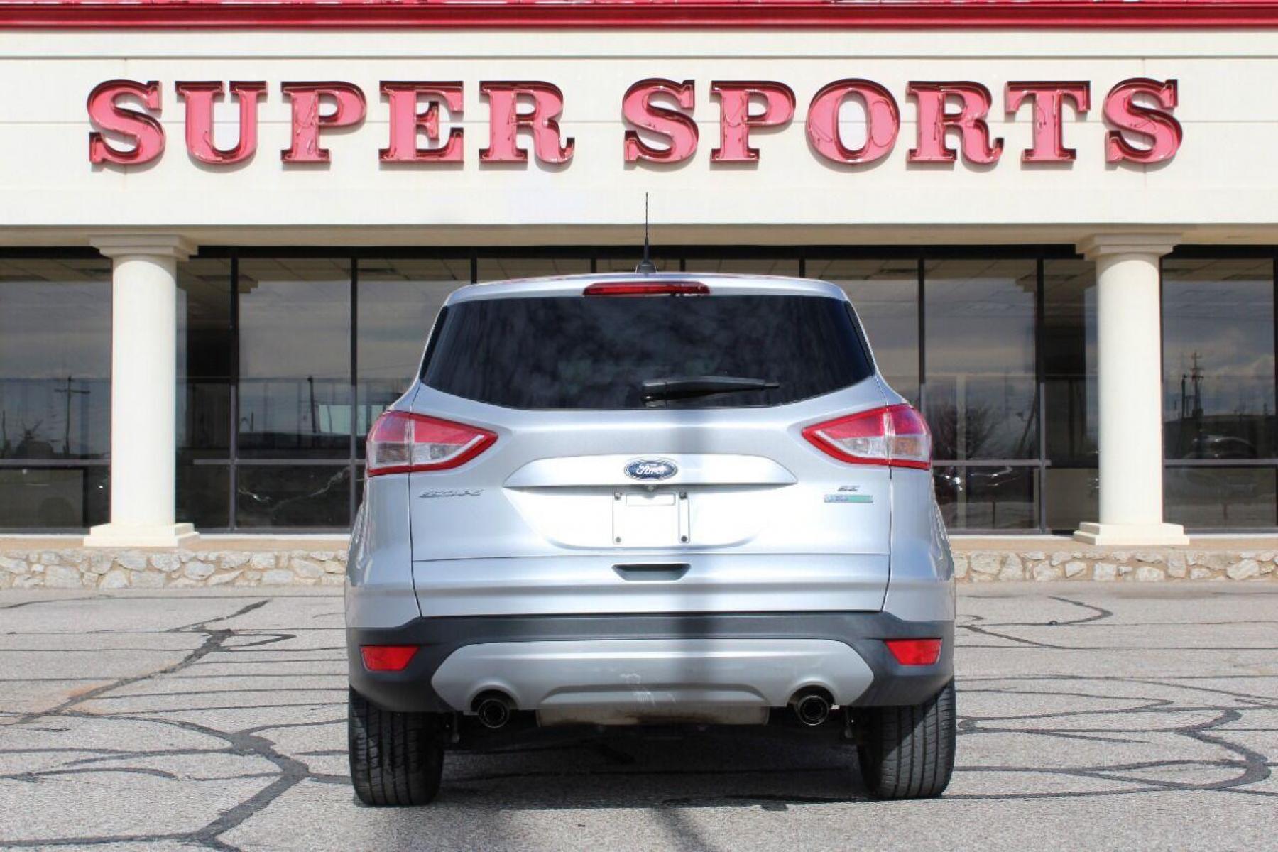 2014 Silver Ford Escape (1FMCU0GX3EU) with an 1.6L I4 Turbocharger 1.6L I4 engine, Automatic 6-Speed transmission, located at 4301 NW 39th , Oklahoma City, OK, 73112, (405) 949-5600, 35.512135, -97.598671 - NO DRIVERS LICENCE NO-FULL COVERAGE INSURANCE-NO CREDIT CHECK. COME ON OVER TO SUPERSPORTS AND TAKE A LOOK AND TEST DRIVE PLEASE GIVE US A CALL AT (405) 949-5600. NO LICENSIA DE MANEJAR- NO SEGURO DE COBERTURA TOTAL- NO VERIFICACCION DE CREDITO. POR FAVOR VENGAN A SUPERSPORTS, E - Photo #4