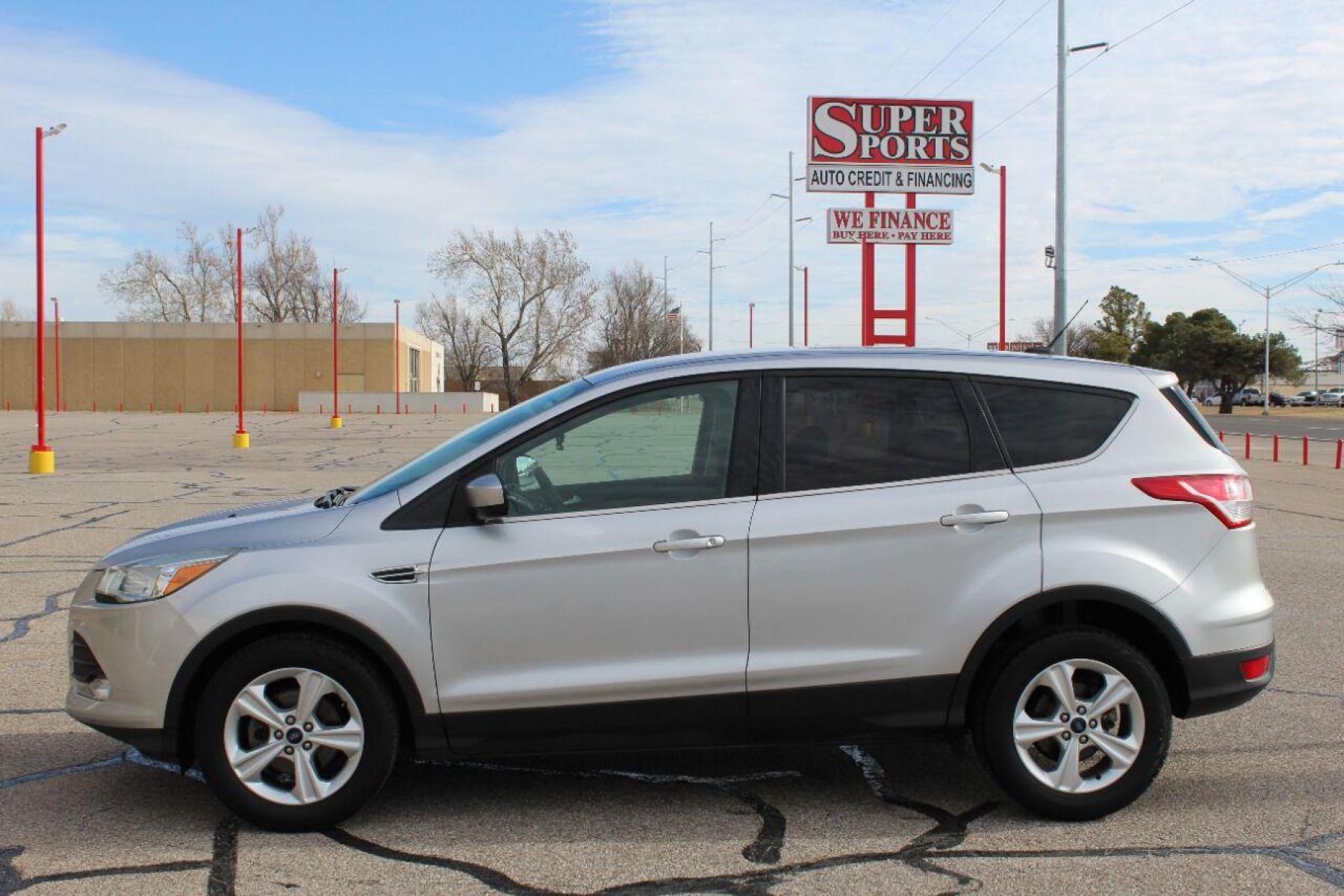2014 Silver Ford Escape (1FMCU0GX3EU) with an 1.6L I4 Turbocharger 1.6L I4 engine, Automatic 6-Speed transmission, located at 4301 NW 39th , Oklahoma City, OK, 73112, (405) 949-5600, 35.512135, -97.598671 - NO DRIVERS LICENCE NO-FULL COVERAGE INSURANCE-NO CREDIT CHECK. COME ON OVER TO SUPERSPORTS AND TAKE A LOOK AND TEST DRIVE PLEASE GIVE US A CALL AT (405) 949-5600. NO LICENSIA DE MANEJAR- NO SEGURO DE COBERTURA TOTAL- NO VERIFICACCION DE CREDITO. POR FAVOR VENGAN A SUPERSPORTS, E - Photo #6