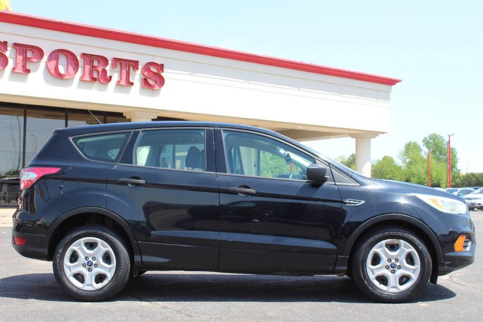 2017 Black Ford Escape S FWD (1FMCU0F73HU) with an 2.5L L4 DOHC 16V engine, 6A transmission, located at 4301 NW 39th , Oklahoma City, OK, 73112, (405) 949-5600, 35.512135, -97.598671 - NO DRIVERS LICENCE NO-FULL COVERAGE INSURANCE-NO CREDIT CHECK. COME ON OVER TO SUPERSPORTS AND TAKE A LOOK AND TEST DRIVE. PLEASE GIVE US A CALL AT (405) 949-5600. NO LICENSIA DE MANEJAR- NO SEGURO DE COBERTURA TOTAL- NO VERIFICACCION DE CREDITO. POR FAVOR VENGAN A SUPERSPORTS, - Photo#2