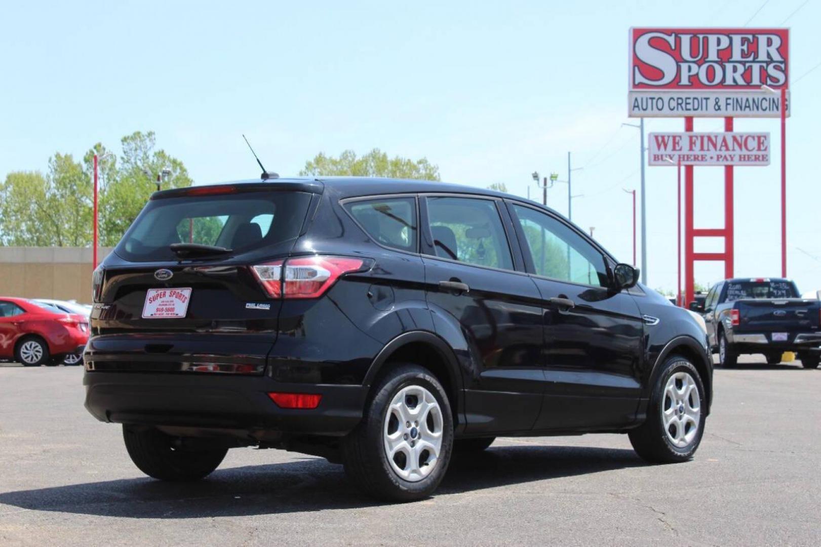 2017 Black Ford Escape S FWD (1FMCU0F73HU) with an 2.5L L4 DOHC 16V engine, 6A transmission, located at 4301 NW 39th , Oklahoma City, OK, 73112, (405) 949-5600, 35.512135, -97.598671 - NO DRIVERS LICENCE NO-FULL COVERAGE INSURANCE-NO CREDIT CHECK. COME ON OVER TO SUPERSPORTS AND TAKE A LOOK AND TEST DRIVE. PLEASE GIVE US A CALL AT (405) 949-5600. NO LICENSIA DE MANEJAR- NO SEGURO DE COBERTURA TOTAL- NO VERIFICACCION DE CREDITO. POR FAVOR VENGAN A SUPERSPORTS, - Photo#3