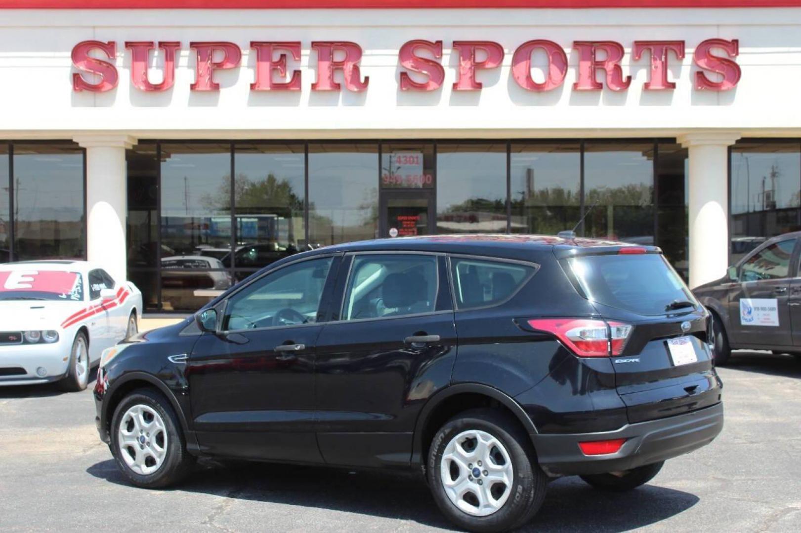 2017 Black Ford Escape S FWD (1FMCU0F73HU) with an 2.5L L4 DOHC 16V engine, 6A transmission, located at 4301 NW 39th , Oklahoma City, OK, 73112, (405) 949-5600, 35.512135, -97.598671 - NO DRIVERS LICENCE NO-FULL COVERAGE INSURANCE-NO CREDIT CHECK. COME ON OVER TO SUPERSPORTS AND TAKE A LOOK AND TEST DRIVE. PLEASE GIVE US A CALL AT (405) 949-5600. NO LICENSIA DE MANEJAR- NO SEGURO DE COBERTURA TOTAL- NO VERIFICACCION DE CREDITO. POR FAVOR VENGAN A SUPERSPORTS, - Photo#4