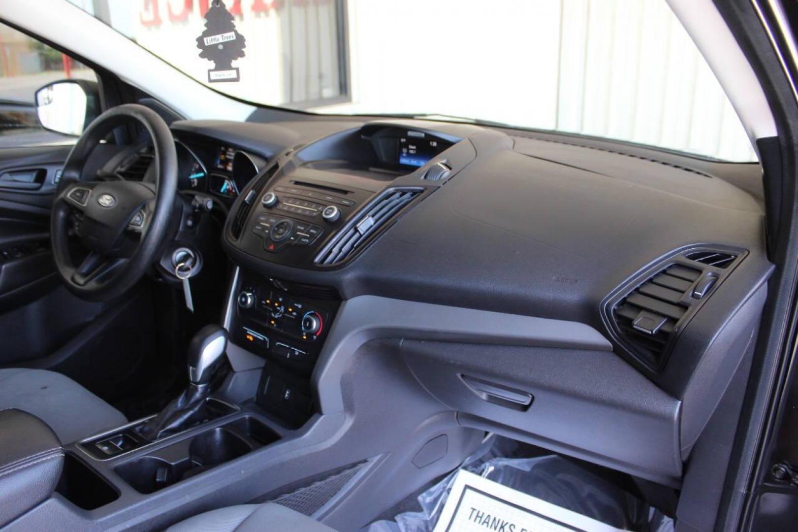 2017 Black Ford Escape S FWD (1FMCU0F73HU) with an 2.5L L4 DOHC 16V engine, 6A transmission, located at 4301 NW 39th , Oklahoma City, OK, 73112, (405) 949-5600, 35.512135, -97.598671 - NO DRIVERS LICENCE NO-FULL COVERAGE INSURANCE-NO CREDIT CHECK. COME ON OVER TO SUPERSPORTS AND TAKE A LOOK AND TEST DRIVE. PLEASE GIVE US A CALL AT (405) 949-5600. NO LICENSIA DE MANEJAR- NO SEGURO DE COBERTURA TOTAL- NO VERIFICACCION DE CREDITO. POR FAVOR VENGAN A SUPERSPORTS, - Photo#8