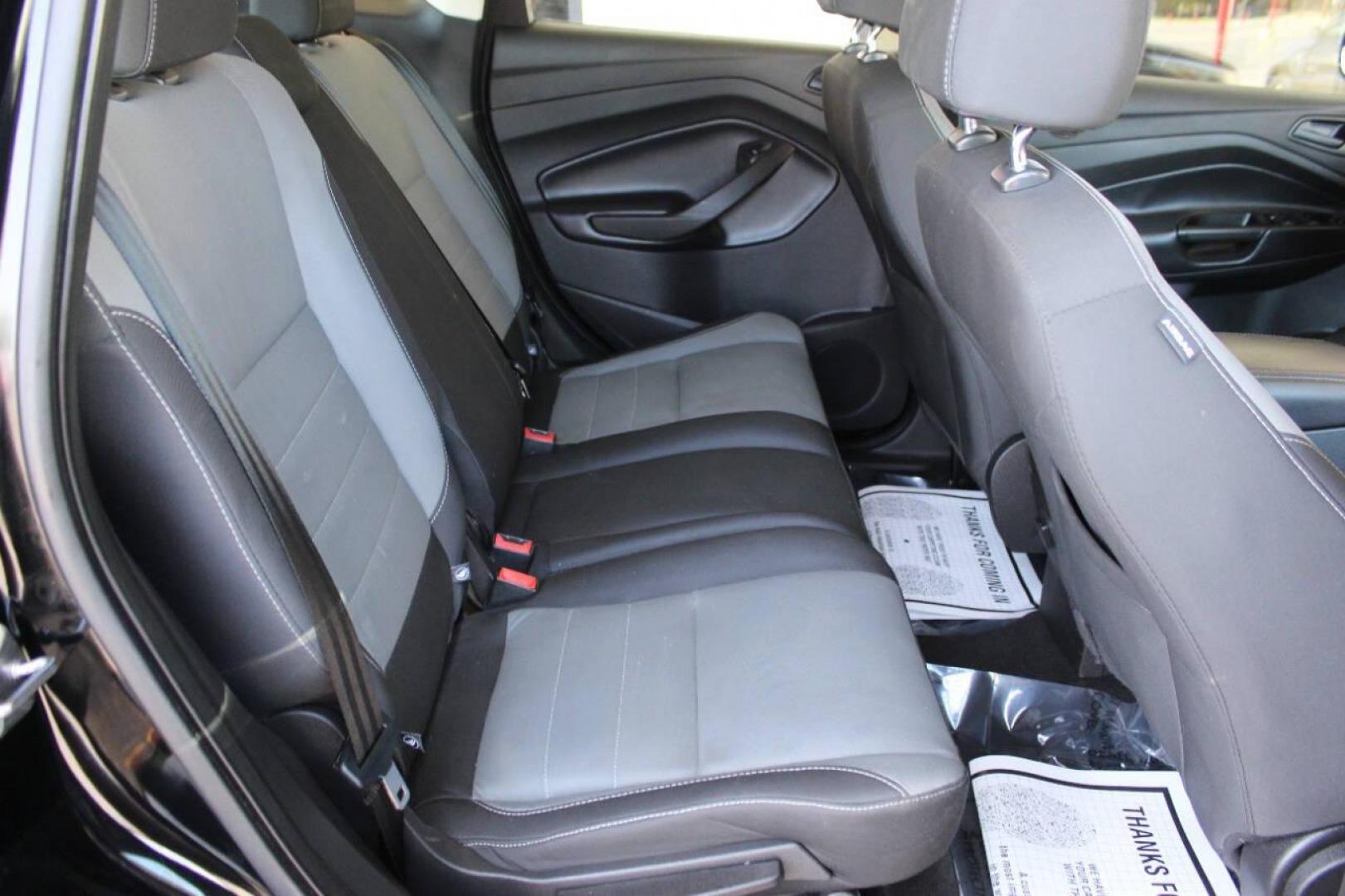 2017 Black Ford Escape S FWD (1FMCU0F73HU) with an 2.5L L4 DOHC 16V engine, 6A transmission, located at 4301 NW 39th , Oklahoma City, OK, 73112, (405) 949-5600, 35.512135, -97.598671 - NO DRIVERS LICENCE NO-FULL COVERAGE INSURANCE-NO CREDIT CHECK. COME ON OVER TO SUPERSPORTS AND TAKE A LOOK AND TEST DRIVE. PLEASE GIVE US A CALL AT (405) 949-5600. NO LICENSIA DE MANEJAR- NO SEGURO DE COBERTURA TOTAL- NO VERIFICACCION DE CREDITO. POR FAVOR VENGAN A SUPERSPORTS, - Photo#12
