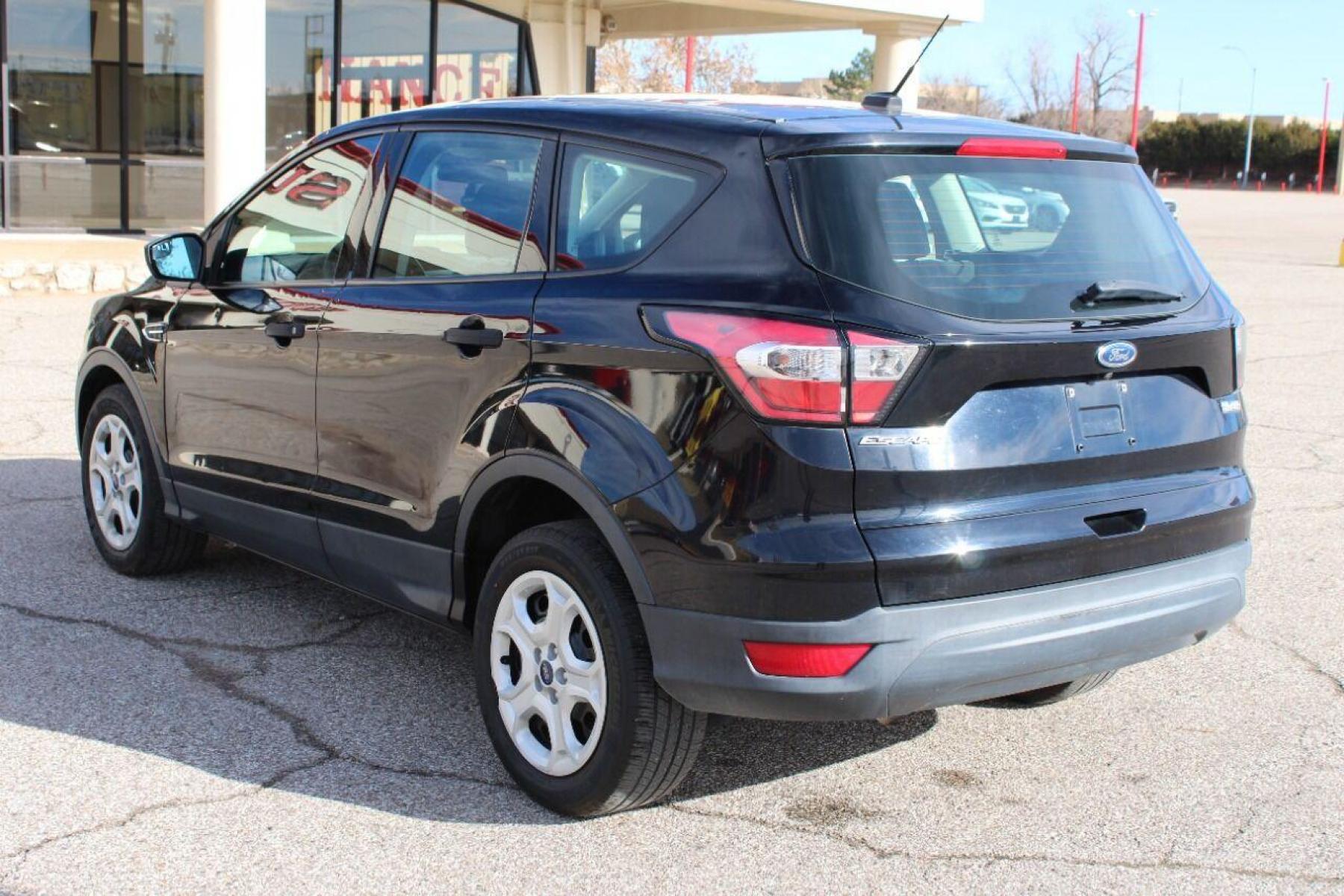 2017 Black Ford Escape (1FMCU0F73HU) with an 2.5L I4 2.5L I4 engine, Automatic 6-Speed transmission, located at 4301 NW 39th , Oklahoma City, OK, 73112, (405) 949-5600, 35.512135, -97.598671 - NO DRIVERS LICENCE NO-FULL COVERAGE INSURANCE-NO CREDIT CHECK. COME ON OVER TO SUPERSPORTS AND TAKE A LOOK AND TEST DRIVE PLEASE GIVE US A CALL AT (405) 949-5600. NO LICENSIA DE MANEJAR- NO SEGURO DE COBERTURA TOTAL- NO VERIFICACCION DE CREDITO. POR FAVOR VENGAN A SUPERSPORTS, E - Photo #3