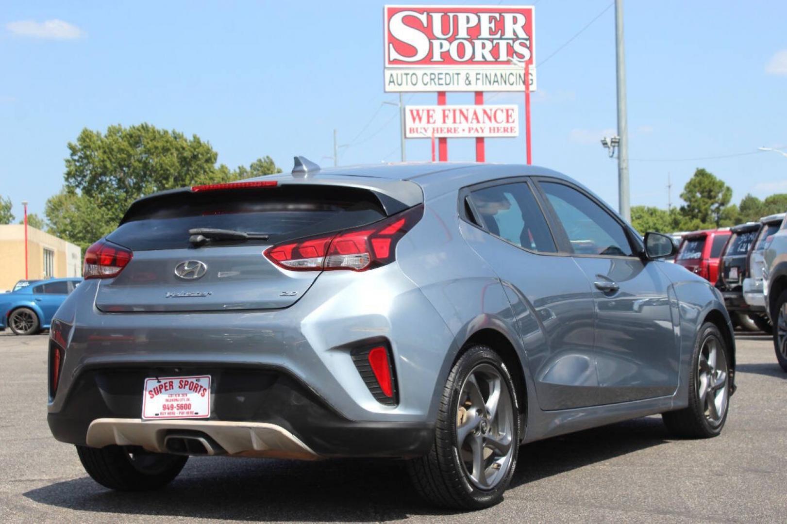 2019 Blue Hyundai Veloster 2.0 6A (KMHTG6AF0KU) with an 2.0L I4 2.0L I4 engine, Automatic 6-Speed transmission, located at 4301 NW 39th , Oklahoma City, OK, 73112, (405) 949-5600, 35.512135, -97.598671 - Hablamos espanol. SPEND SMART --- BUY FROM SUPER SPORTS. ALL PRICES, DOWN PAYMENTS, PAYMENTS, AND FINANCE TERMS ARE NEGOTIABLE AT THE TIME OF APPROVAL. WE WILL WORK WITH YOU TO FIT YOUR BUDGET. WE WILL EVEN LOWER AND ADJUST THE NUMBERS TO HELP MAKE THE VE HICLE MORE AFFORDABLE FOR YOU.- Photo#2