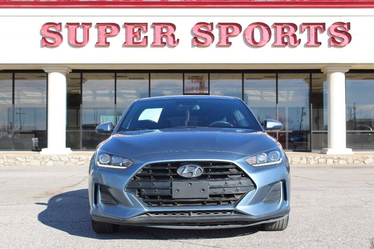 2019 Blue Hyundai Veloster 2.0 6A (KMHTG6AF0KU) with an 2.0L I4 2.0L I4 engine, Automatic 6-Speed transmission, located at 4301 NW 39th , Oklahoma City, OK, 73112, (405) 949-5600, 35.512135, -97.598671 - NO DRIVERS LICENCE NO-FULL COVERAGE INSURANCE-NO CREDIT CHECK. COME ON OVER TO SUPERSPORTS AND TAKE A LOOK AND TEST DRIVE. PLEASE GIVE US A CALL AT (405) 949-5600. NO LICENSIA DE MANEJAR- NO SEGURO DE COBERTURA TOTAL- NO VERIFICACCION DE CREDITO. POR FAVOR VENGAN A SUPERSPORTS, ECHE UN - Photo#2