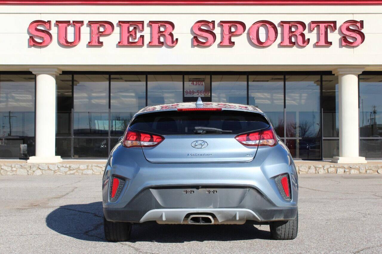 2019 Blue Hyundai Veloster 2.0 6A (KMHTG6AF0KU) with an 2.0L I4 2.0L I4 engine, Automatic 6-Speed transmission, located at 4301 NW 39th , Oklahoma City, OK, 73112, (405) 949-5600, 35.512135, -97.598671 - NO DRIVERS LICENCE NO-FULL COVERAGE INSURANCE-NO CREDIT CHECK. COME ON OVER TO SUPERSPORTS AND TAKE A LOOK AND TEST DRIVE. PLEASE GIVE US A CALL AT (405) 949-5600. NO LICENSIA DE MANEJAR- NO SEGURO DE COBERTURA TOTAL- NO VERIFICACCION DE CREDITO. POR FAVOR VENGAN A SUPERSPORTS, ECHE UN - Photo#4
