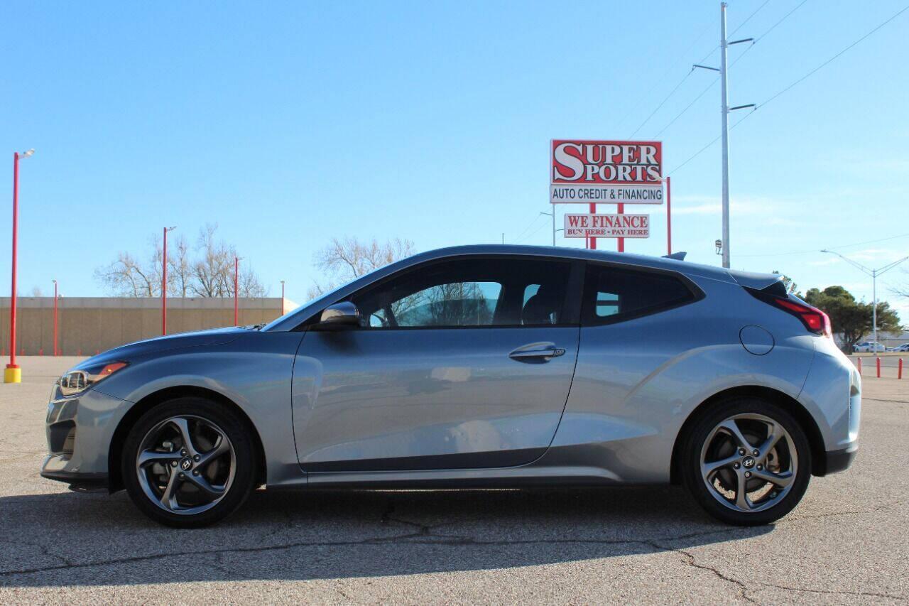 2019 Blue Hyundai Veloster 2.0 6A (KMHTG6AF0KU) with an 2.0L I4 2.0L I4 engine, Automatic 6-Speed transmission, located at 4301 NW 39th , Oklahoma City, OK, 73112, (405) 949-5600, 35.512135, -97.598671 - NO DRIVERS LICENCE NO-FULL COVERAGE INSURANCE-NO CREDIT CHECK. COME ON OVER TO SUPERSPORTS AND TAKE A LOOK AND TEST DRIVE. PLEASE GIVE US A CALL AT (405) 949-5600. NO LICENSIA DE MANEJAR- NO SEGURO DE COBERTURA TOTAL- NO VERIFICACCION DE CREDITO. POR FAVOR VENGAN A SUPERSPORTS, ECHE UN - Photo#6