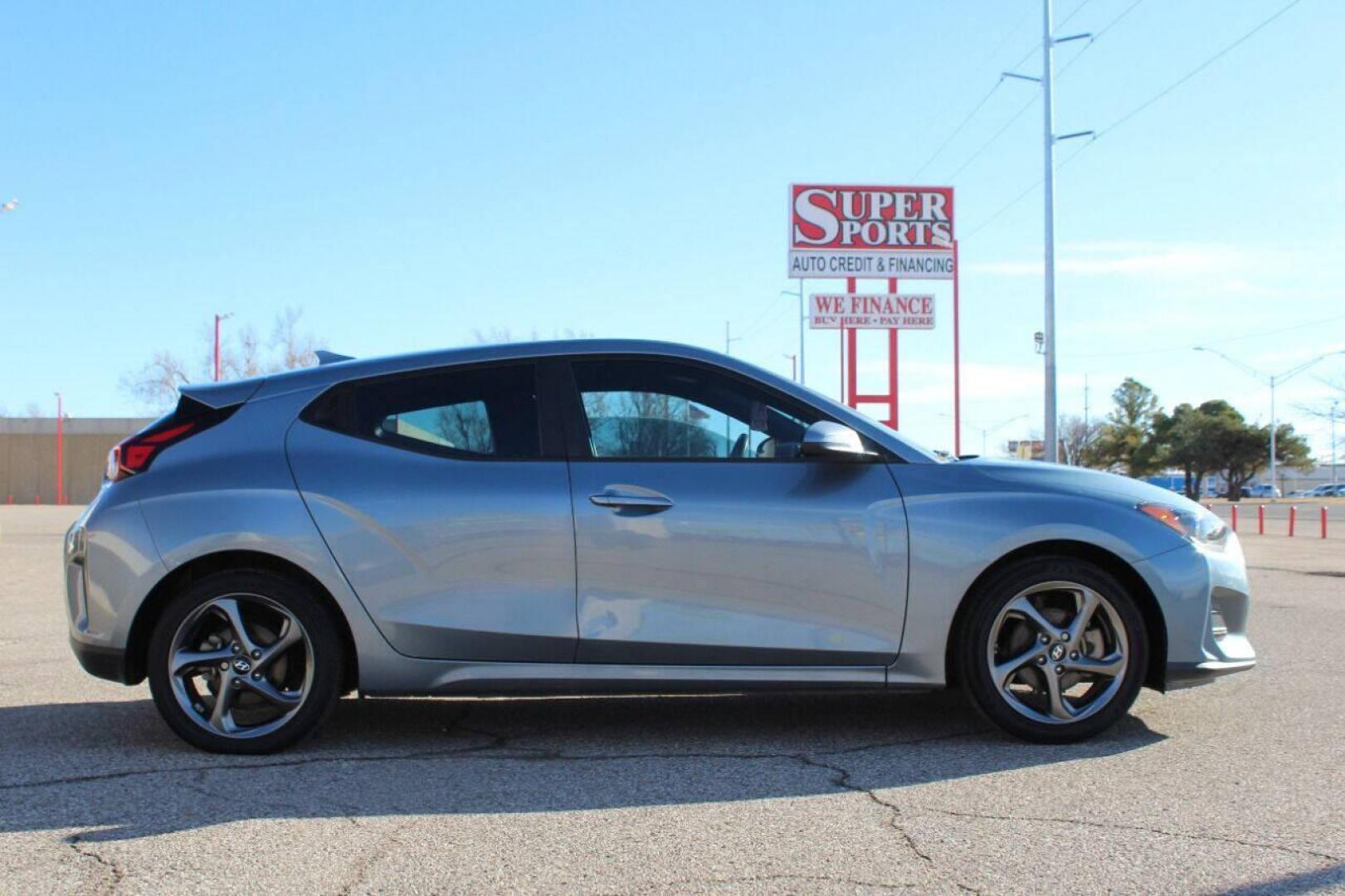 2019 Blue Hyundai Veloster 2.0 6A (KMHTG6AF0KU) with an 2.0L L4 DOHC 16V engine, 6A transmission, located at 4301 NW 39th , Oklahoma City, OK, 73112, (405) 949-5600, 35.512135, -97.598671 - NO DRIVERS LICENCE NO-FULL COVERAGE INSURANCE-NO CREDIT CHECK. COME ON OVER TO SUPERSPORTS AND TAKE A LOOK AND TEST DRIVE. PLEASE GIVE US A CALL AT (405) 949-5600. NO LICENSIA DE MANEJAR- NO SEGURO DE COBERTURA TOTAL- NO VERIFICACCION DE CREDITO. POR FAVOR VENGAN A SUPERSPORTS, ECHE UN - Photo#3