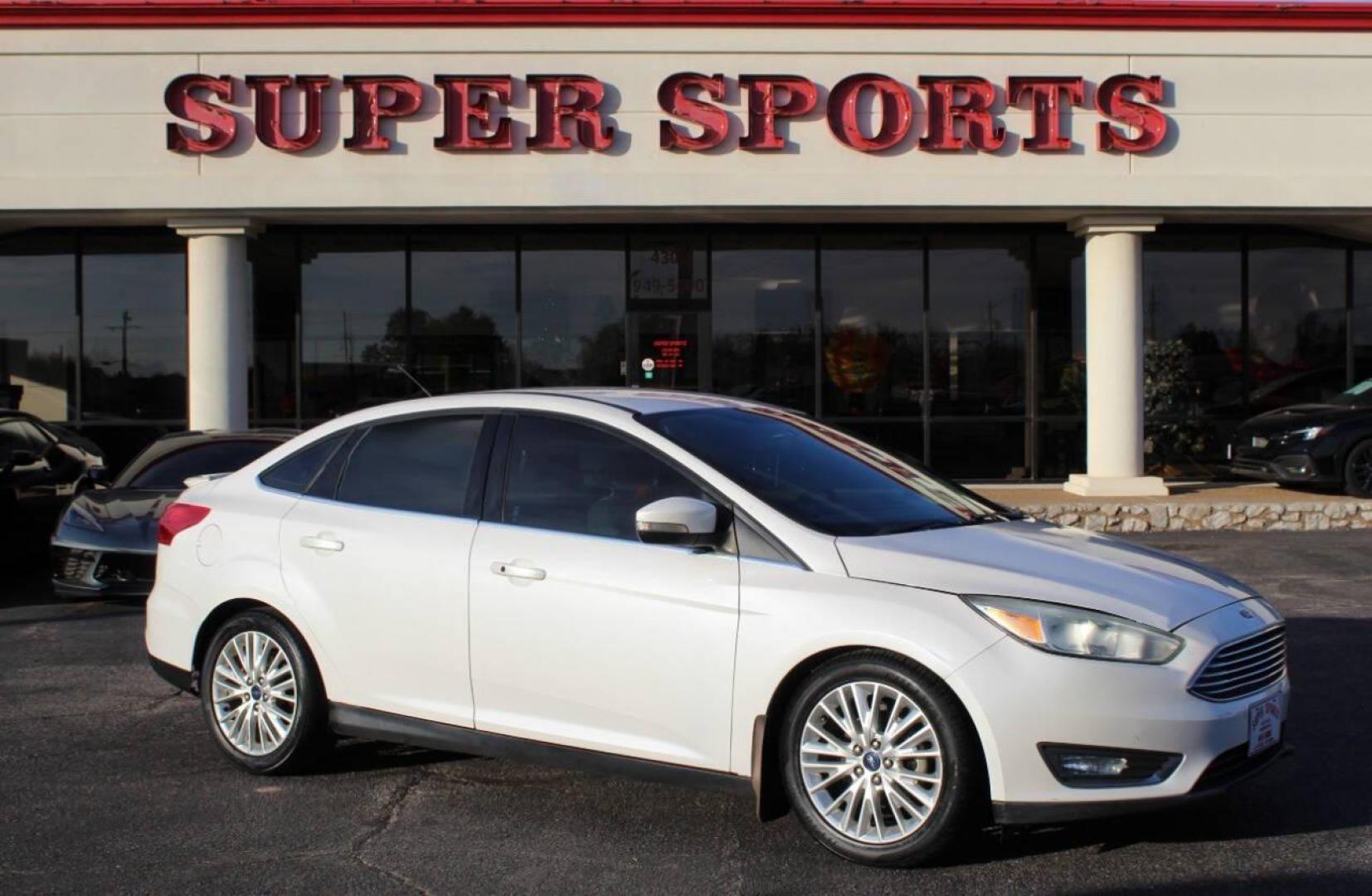 2016 White Ford Focus Titanium Sedan (1FADP3J27GL) with an 2.0L L4 DOHC 16V engine, 6A transmission, located at 4301 NW 39th , Oklahoma City, OK, 73112, (405) 949-5600, 35.512135, -97.598671 - NO DRIVERS LICENCE NO-FULL COVERAGE INSURANCE-NO CREDIT CHECK. COME ON OVER TO SUPERSPORTS AND TAKE A LOOK AND TEST DRIVE PLEASE GIVE US A CALL AT (405) 949-5600. NO LICENSIA DE MANEJAR- NO SEGURO DE COBERTURA TOTAL- NO VERIFICACCION DE CREDITO. POR FAVOR VENGAN A SUPERSPORTS, ECHE UN V - Photo#0