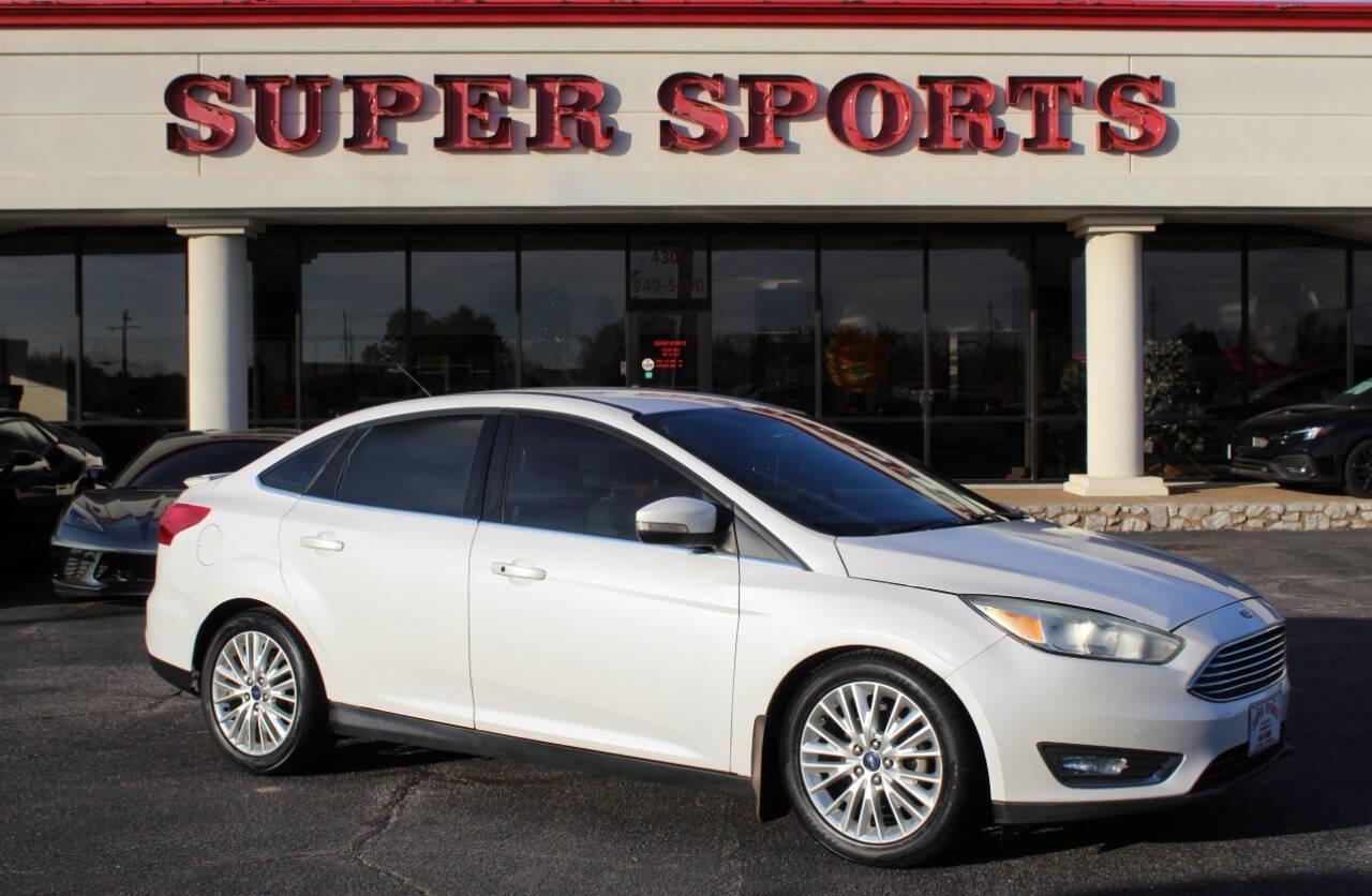 2016 White Ford Focus Titanium Sedan (1FADP3J27GL) with an 2.0L L4 DOHC 16V engine, 6A transmission, located at 4301 NW 39th , Oklahoma City, OK, 73112, (405) 949-5600, 35.512135, -97.598671 - NO DRIVERS LICENCE NO-FULL COVERAGE INSURANCE-NO CREDIT CHECK. COME ON OVER TO SUPERSPORTS AND TAKE A LOOK AND TEST DRIVE PLEASE GIVE US A CALL AT (405) 949-5600. NO LICENSIA DE MANEJAR- NO SEGURO DE COBERTURA TOTAL- NO VERIFICACCION DE CREDITO. POR FAVOR VENGAN A SUPERSPORTS, ECHE UN V - Photo#0