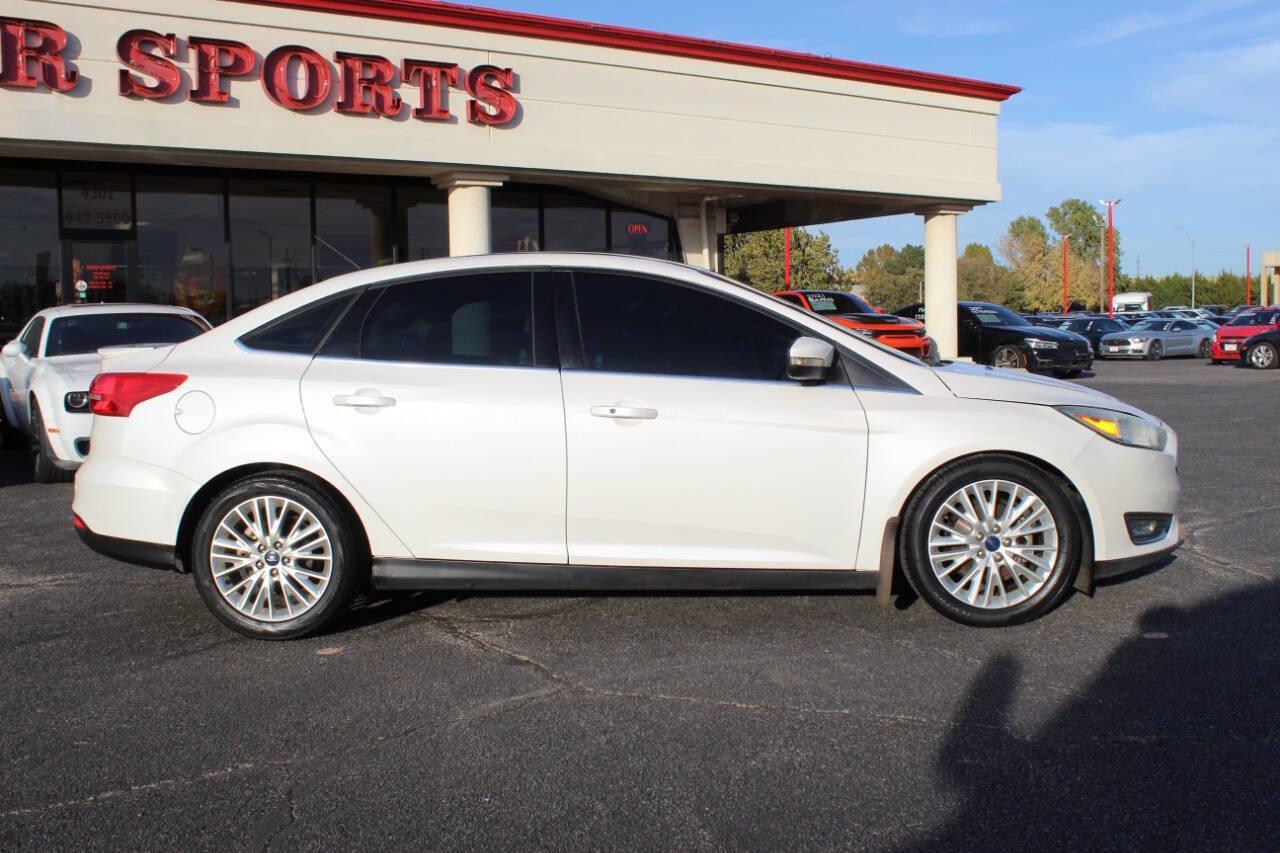 2016 White Ford Focus Titanium Sedan (1FADP3J27GL) with an 2.0L L4 DOHC 16V engine, 6A transmission, located at 4301 NW 39th , Oklahoma City, OK, 73112, (405) 949-5600, 35.512135, -97.598671 - NO DRIVERS LICENCE NO-FULL COVERAGE INSURANCE-NO CREDIT CHECK. COME ON OVER TO SUPERSPORTS AND TAKE A LOOK AND TEST DRIVE PLEASE GIVE US A CALL AT (405) 949-5600. NO LICENSIA DE MANEJAR- NO SEGURO DE COBERTURA TOTAL- NO VERIFICACCION DE CREDITO. POR FAVOR VENGAN A SUPERSPORTS, ECHE UN V - Photo#2