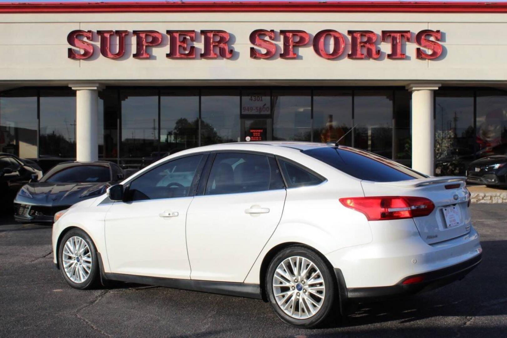 2016 White Ford Focus Titanium Sedan (1FADP3J27GL) with an 2.0L L4 DOHC 16V engine, 6A transmission, located at 4301 NW 39th , Oklahoma City, OK, 73112, (405) 949-5600, 35.512135, -97.598671 - NO DRIVERS LICENCE NO-FULL COVERAGE INSURANCE-NO CREDIT CHECK. COME ON OVER TO SUPERSPORTS AND TAKE A LOOK AND TEST DRIVE PLEASE GIVE US A CALL AT (405) 949-5600. NO LICENSIA DE MANEJAR- NO SEGURO DE COBERTURA TOTAL- NO VERIFICACCION DE CREDITO. POR FAVOR VENGAN A SUPERSPORTS, ECHE UN V - Photo#4