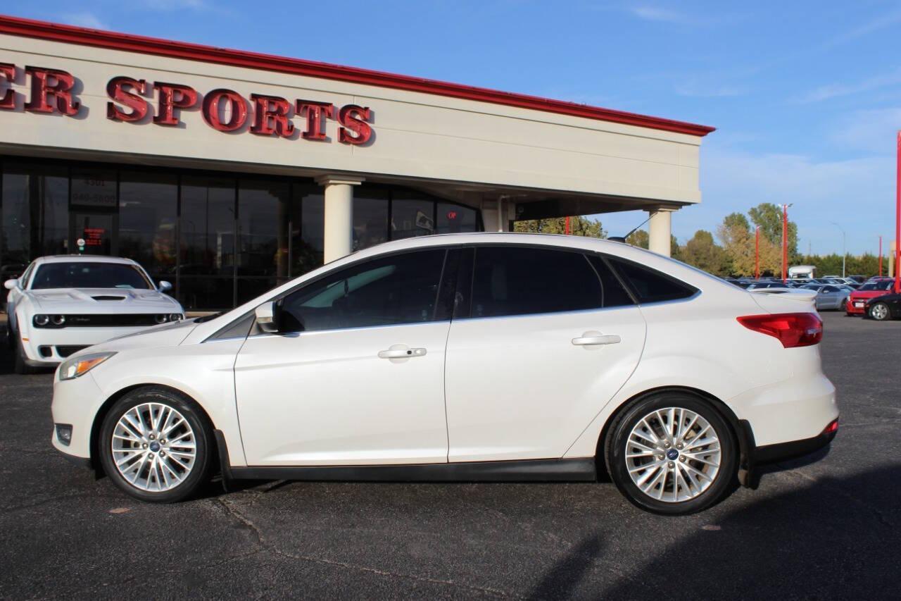 2016 White Ford Focus Titanium Sedan (1FADP3J27GL) with an 2.0L L4 DOHC 16V engine, 6A transmission, located at 4301 NW 39th , Oklahoma City, OK, 73112, (405) 949-5600, 35.512135, -97.598671 - NO DRIVERS LICENCE NO-FULL COVERAGE INSURANCE-NO CREDIT CHECK. COME ON OVER TO SUPERSPORTS AND TAKE A LOOK AND TEST DRIVE PLEASE GIVE US A CALL AT (405) 949-5600. NO LICENSIA DE MANEJAR- NO SEGURO DE COBERTURA TOTAL- NO VERIFICACCION DE CREDITO. POR FAVOR VENGAN A SUPERSPORTS, ECHE UN V - Photo#5