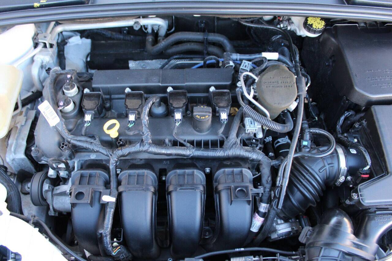 2016 White Ford Focus Titanium Sedan (1FADP3J27GL) with an 2.0L L4 DOHC 16V engine, 6A transmission, located at 4301 NW 39th , Oklahoma City, OK, 73112, (405) 949-5600, 35.512135, -97.598671 - NO DRIVERS LICENCE NO-FULL COVERAGE INSURANCE-NO CREDIT CHECK. COME ON OVER TO SUPERSPORTS AND TAKE A LOOK AND TEST DRIVE PLEASE GIVE US A CALL AT (405) 949-5600. NO LICENSIA DE MANEJAR- NO SEGURO DE COBERTURA TOTAL- NO VERIFICACCION DE CREDITO. POR FAVOR VENGAN A SUPERSPORTS, ECHE UN V - Photo#7