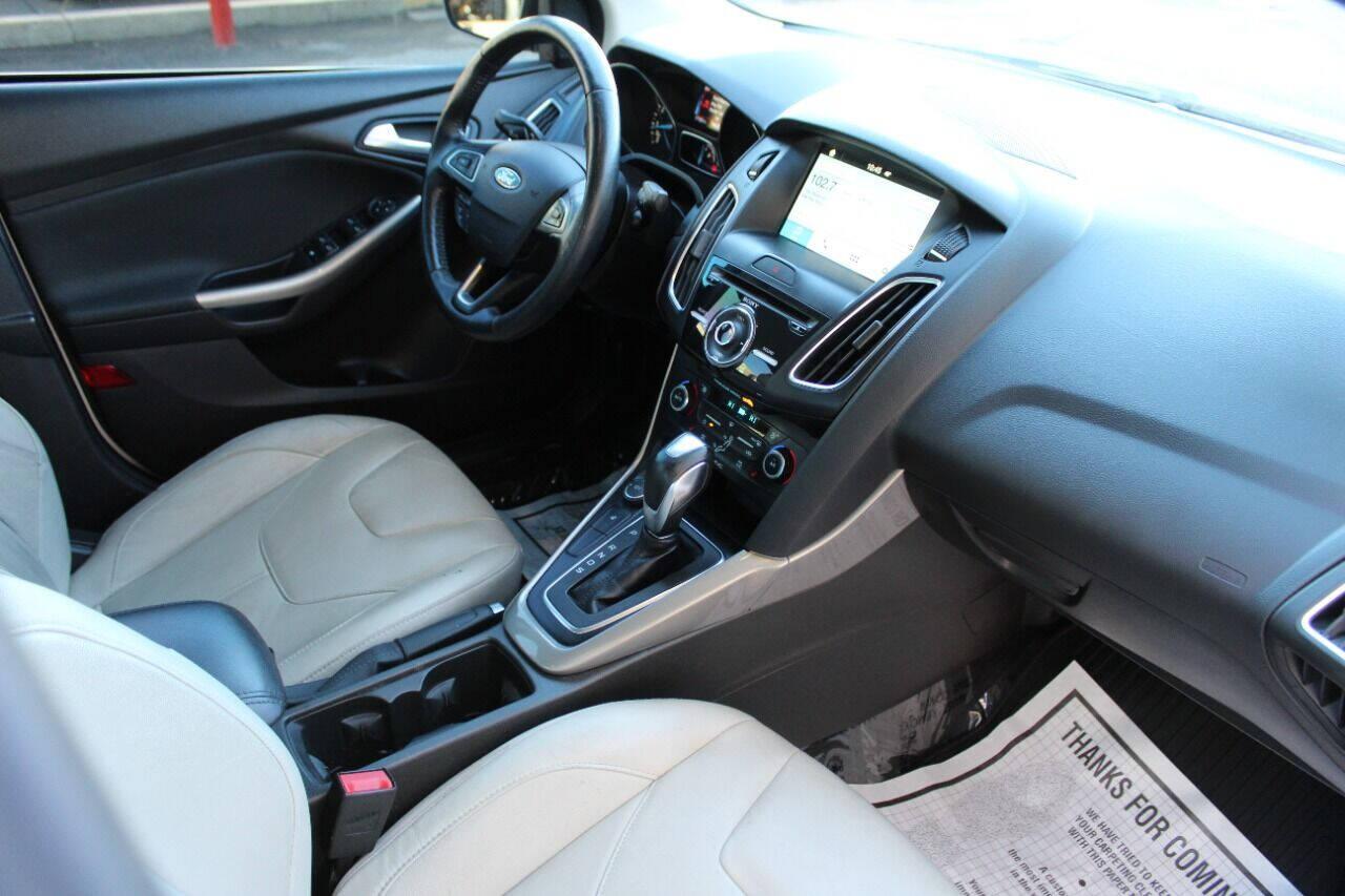 2016 White Ford Focus Titanium Sedan (1FADP3J27GL) with an 2.0L L4 DOHC 16V engine, 6A transmission, located at 4301 NW 39th , Oklahoma City, OK, 73112, (405) 949-5600, 35.512135, -97.598671 - NO DRIVERS LICENCE NO-FULL COVERAGE INSURANCE-NO CREDIT CHECK. COME ON OVER TO SUPERSPORTS AND TAKE A LOOK AND TEST DRIVE PLEASE GIVE US A CALL AT (405) 949-5600. NO LICENSIA DE MANEJAR- NO SEGURO DE COBERTURA TOTAL- NO VERIFICACCION DE CREDITO. POR FAVOR VENGAN A SUPERSPORTS, ECHE UN V - Photo#8