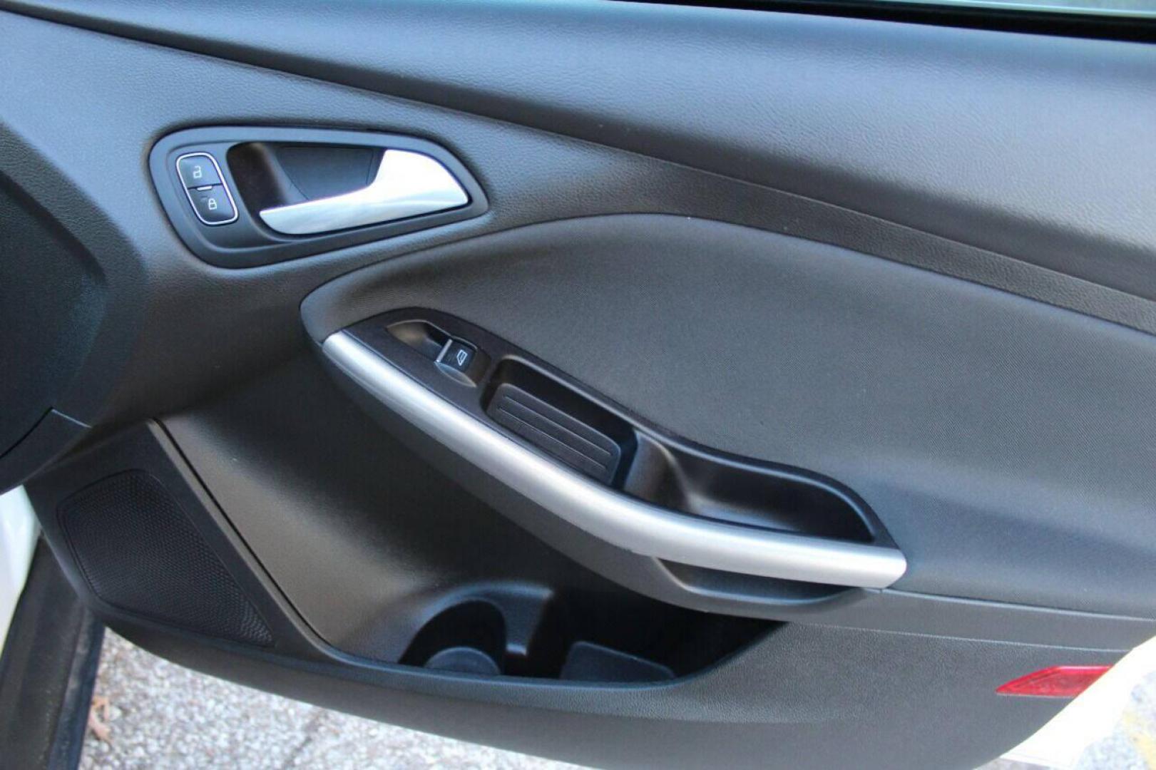 2016 White Ford Focus Titanium Sedan (1FADP3J27GL) with an 2.0L L4 DOHC 16V engine, 6A transmission, located at 4301 NW 39th , Oklahoma City, OK, 73112, (405) 949-5600, 35.512135, -97.598671 - NO DRIVERS LICENCE NO-FULL COVERAGE INSURANCE-NO CREDIT CHECK. COME ON OVER TO SUPERSPORTS AND TAKE A LOOK AND TEST DRIVE PLEASE GIVE US A CALL AT (405) 949-5600. NO LICENSIA DE MANEJAR- NO SEGURO DE COBERTURA TOTAL- NO VERIFICACCION DE CREDITO. POR FAVOR VENGAN A SUPERSPORTS, ECHE UN V - Photo#9