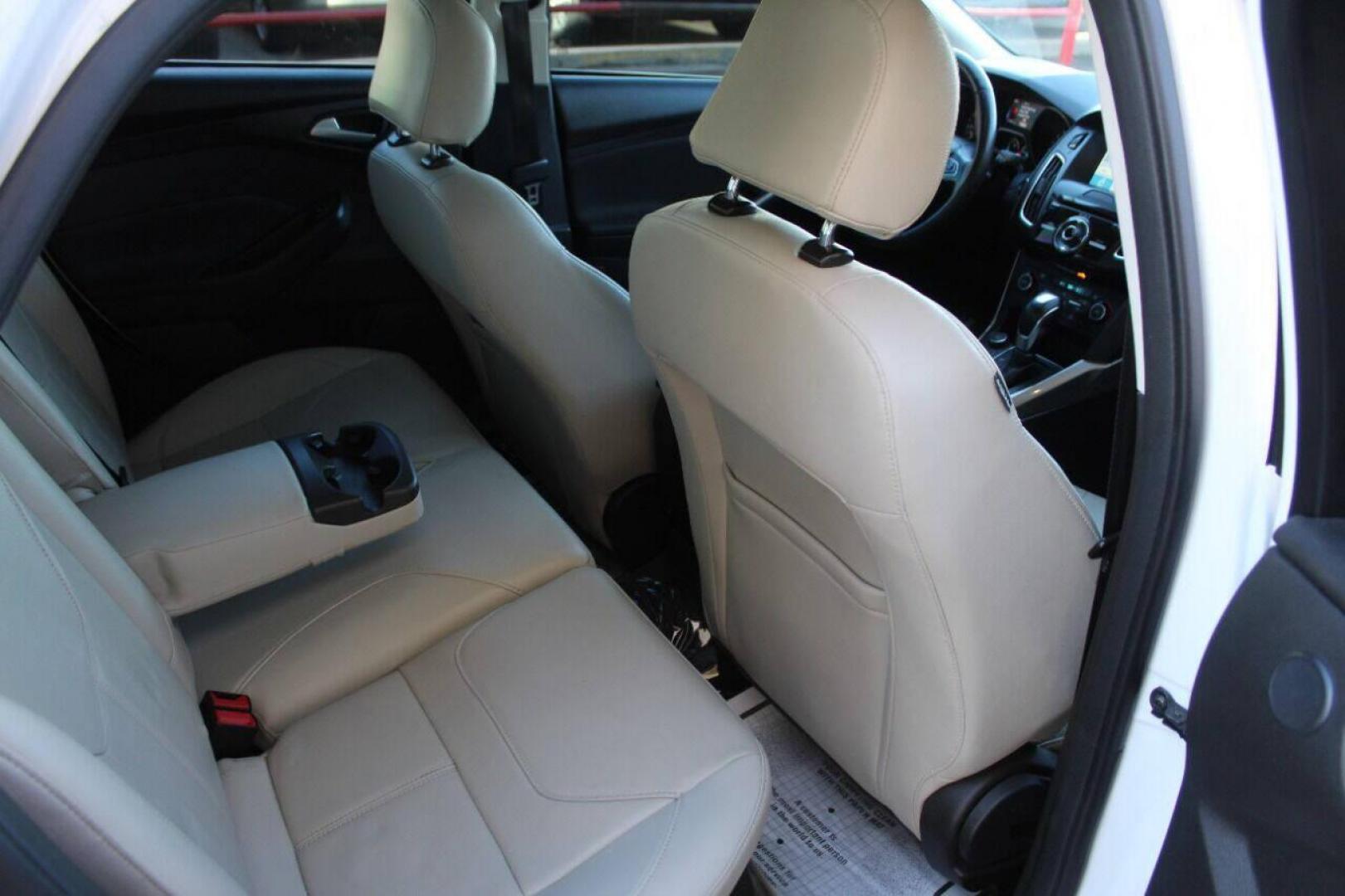 2016 White Ford Focus Titanium Sedan (1FADP3J27GL) with an 2.0L L4 DOHC 16V engine, 6A transmission, located at 4301 NW 39th , Oklahoma City, OK, 73112, (405) 949-5600, 35.512135, -97.598671 - NO DRIVERS LICENCE NO-FULL COVERAGE INSURANCE-NO CREDIT CHECK. COME ON OVER TO SUPERSPORTS AND TAKE A LOOK AND TEST DRIVE PLEASE GIVE US A CALL AT (405) 949-5600. NO LICENSIA DE MANEJAR- NO SEGURO DE COBERTURA TOTAL- NO VERIFICACCION DE CREDITO. POR FAVOR VENGAN A SUPERSPORTS, ECHE UN V - Photo#10