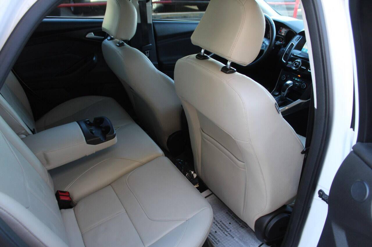 2016 White Ford Focus Titanium Sedan (1FADP3J27GL) with an 2.0L L4 DOHC 16V engine, 6A transmission, located at 4301 NW 39th , Oklahoma City, OK, 73112, (405) 949-5600, 35.512135, -97.598671 - NO DRIVERS LICENCE NO-FULL COVERAGE INSURANCE-NO CREDIT CHECK. COME ON OVER TO SUPERSPORTS AND TAKE A LOOK AND TEST DRIVE PLEASE GIVE US A CALL AT (405) 949-5600. NO LICENSIA DE MANEJAR- NO SEGURO DE COBERTURA TOTAL- NO VERIFICACCION DE CREDITO. POR FAVOR VENGAN A SUPERSPORTS, ECHE UN V - Photo#10