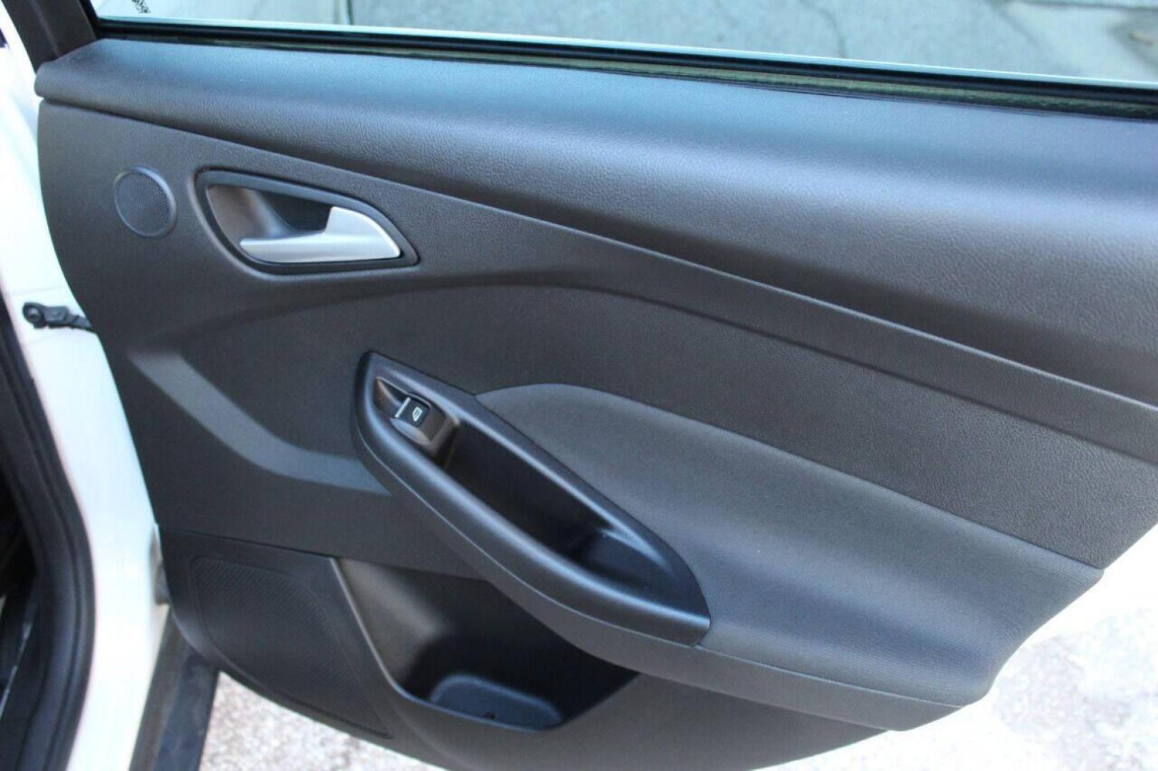 2016 White Ford Focus Titanium Sedan (1FADP3J27GL) with an 2.0L L4 DOHC 16V engine, 6A transmission, located at 4301 NW 39th , Oklahoma City, OK, 73112, (405) 949-5600, 35.512135, -97.598671 - NO DRIVERS LICENCE NO-FULL COVERAGE INSURANCE-NO CREDIT CHECK. COME ON OVER TO SUPERSPORTS AND TAKE A LOOK AND TEST DRIVE PLEASE GIVE US A CALL AT (405) 949-5600. NO LICENSIA DE MANEJAR- NO SEGURO DE COBERTURA TOTAL- NO VERIFICACCION DE CREDITO. POR FAVOR VENGAN A SUPERSPORTS, ECHE UN V - Photo#11