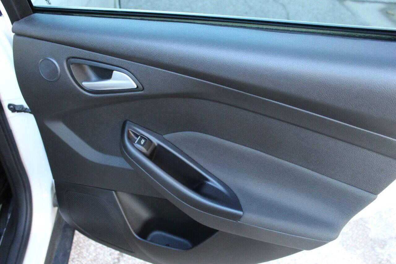 2016 White Ford Focus Titanium Sedan (1FADP3J27GL) with an 2.0L L4 DOHC 16V engine, 6A transmission, located at 4301 NW 39th , Oklahoma City, OK, 73112, (405) 949-5600, 35.512135, -97.598671 - NO DRIVERS LICENCE NO-FULL COVERAGE INSURANCE-NO CREDIT CHECK. COME ON OVER TO SUPERSPORTS AND TAKE A LOOK AND TEST DRIVE PLEASE GIVE US A CALL AT (405) 949-5600. NO LICENSIA DE MANEJAR- NO SEGURO DE COBERTURA TOTAL- NO VERIFICACCION DE CREDITO. POR FAVOR VENGAN A SUPERSPORTS, ECHE UN V - Photo#11