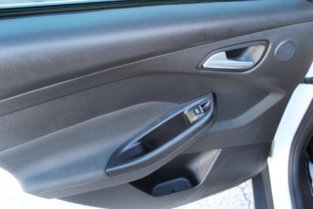 2016 White Ford Focus Titanium Sedan (1FADP3J27GL) with an 2.0L L4 DOHC 16V engine, 6A transmission, located at 4301 NW 39th , Oklahoma City, OK, 73112, (405) 949-5600, 35.512135, -97.598671 - NO DRIVERS LICENCE NO-FULL COVERAGE INSURANCE-NO CREDIT CHECK. COME ON OVER TO SUPERSPORTS AND TAKE A LOOK AND TEST DRIVE PLEASE GIVE US A CALL AT (405) 949-5600. NO LICENSIA DE MANEJAR- NO SEGURO DE COBERTURA TOTAL- NO VERIFICACCION DE CREDITO. POR FAVOR VENGAN A SUPERSPORTS, ECHE UN V - Photo#14