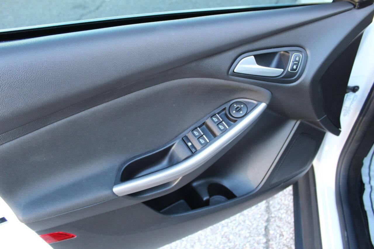 2016 White Ford Focus Titanium Sedan (1FADP3J27GL) with an 2.0L L4 DOHC 16V engine, 6A transmission, located at 4301 NW 39th , Oklahoma City, OK, 73112, (405) 949-5600, 35.512135, -97.598671 - NO DRIVERS LICENCE NO-FULL COVERAGE INSURANCE-NO CREDIT CHECK. COME ON OVER TO SUPERSPORTS AND TAKE A LOOK AND TEST DRIVE PLEASE GIVE US A CALL AT (405) 949-5600. NO LICENSIA DE MANEJAR- NO SEGURO DE COBERTURA TOTAL- NO VERIFICACCION DE CREDITO. POR FAVOR VENGAN A SUPERSPORTS, ECHE UN V - Photo#16