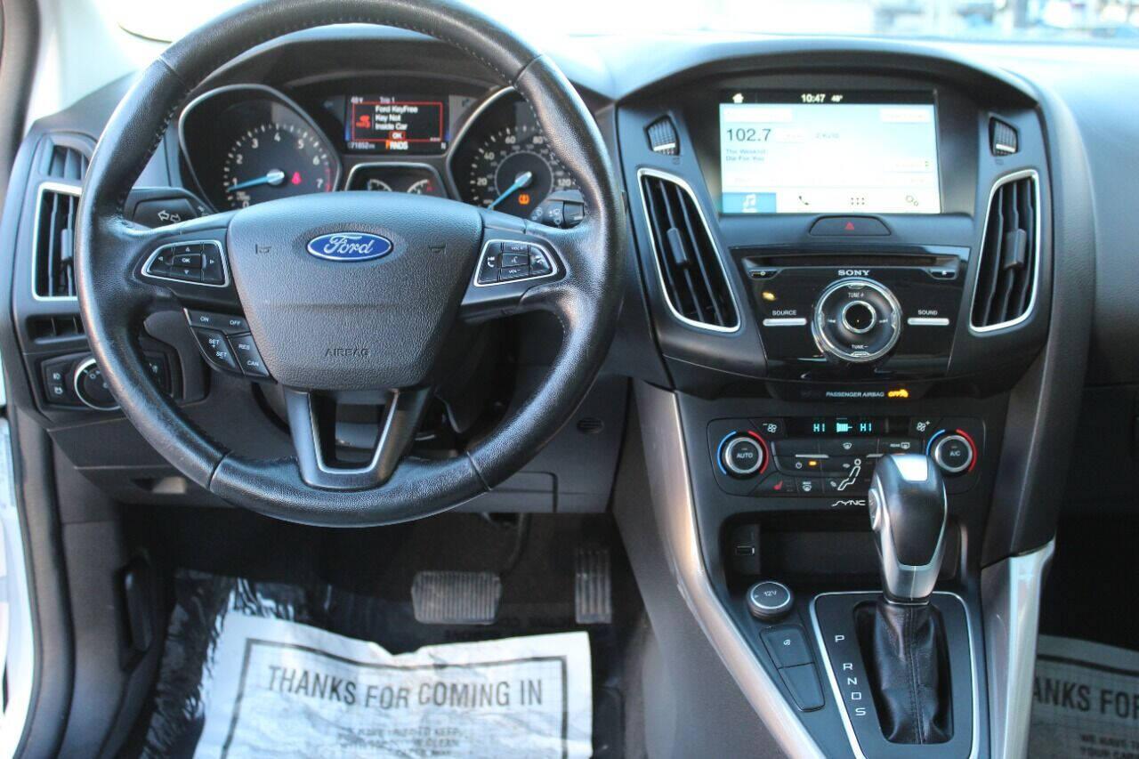 2016 White Ford Focus Titanium Sedan (1FADP3J27GL) with an 2.0L L4 DOHC 16V engine, 6A transmission, located at 4301 NW 39th , Oklahoma City, OK, 73112, (405) 949-5600, 35.512135, -97.598671 - NO DRIVERS LICENCE NO-FULL COVERAGE INSURANCE-NO CREDIT CHECK. COME ON OVER TO SUPERSPORTS AND TAKE A LOOK AND TEST DRIVE PLEASE GIVE US A CALL AT (405) 949-5600. NO LICENSIA DE MANEJAR- NO SEGURO DE COBERTURA TOTAL- NO VERIFICACCION DE CREDITO. POR FAVOR VENGAN A SUPERSPORTS, ECHE UN V - Photo#17
