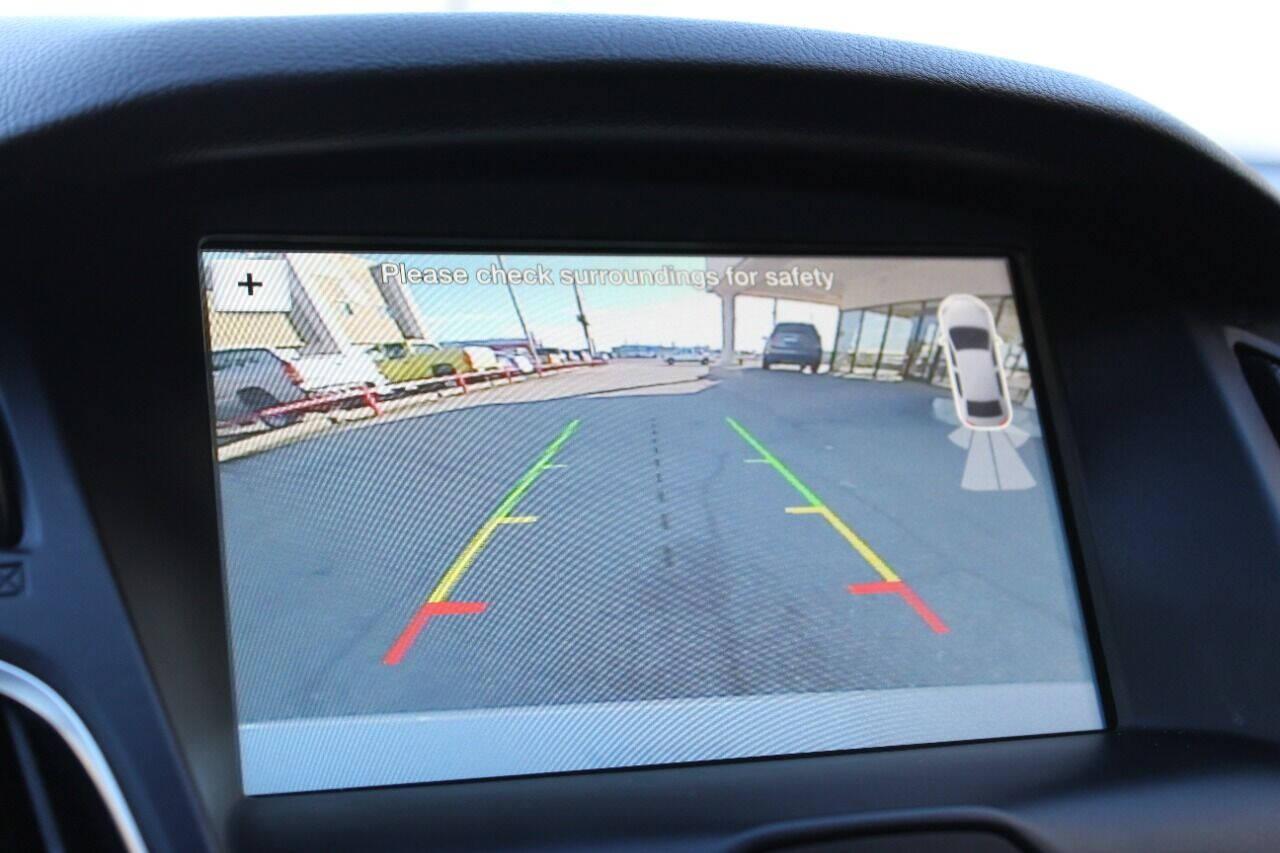 2016 White Ford Focus Titanium Sedan (1FADP3J27GL) with an 2.0L L4 DOHC 16V engine, 6A transmission, located at 4301 NW 39th , Oklahoma City, OK, 73112, (405) 949-5600, 35.512135, -97.598671 - NO DRIVERS LICENCE NO-FULL COVERAGE INSURANCE-NO CREDIT CHECK. COME ON OVER TO SUPERSPORTS AND TAKE A LOOK AND TEST DRIVE PLEASE GIVE US A CALL AT (405) 949-5600. NO LICENSIA DE MANEJAR- NO SEGURO DE COBERTURA TOTAL- NO VERIFICACCION DE CREDITO. POR FAVOR VENGAN A SUPERSPORTS, ECHE UN V - Photo#18