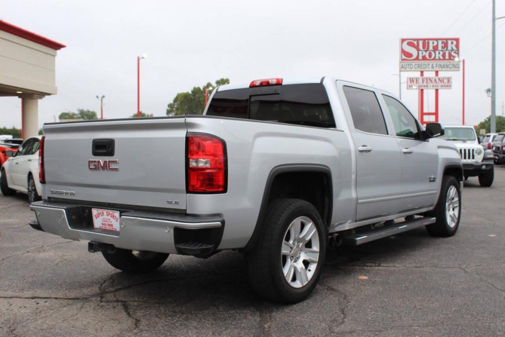 2015 Silver GMC Sierra 1500 SLE Crew Cab Long Box 2WD (3GTP1UEC7FG) with an 5.3L V8 OHV 16V engine, 6-Speed Automatic transmission, located at 4301 NW 39th , Oklahoma City, OK, 73112, (405) 949-5600, 35.512135, -97.598671 - NO DRIVERS LICENCE NO-FULL COVERAGE INSURANCE-NO CREDIT CHECK. COME ON OVER TO SUPERSPORTS AND TAKE A LOOK AND TEST DRIVE. PLEASE GIVE US A CALL AT (405) 949-5600. NO LICENSIA DE MANEJAR- NO SEGURO DE COBERTURA TOTAL- NO VERIFICACCION DE CREDITO. POR FAVOR VENGAN A SUPERSPORTS, - Photo#2