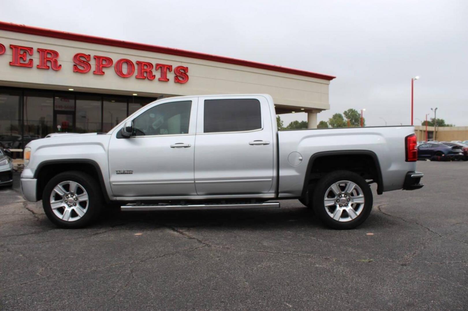 2015 Silver GMC Sierra 1500 SLE Crew Cab Long Box 2WD (3GTP1UEC7FG) with an 5.3L V8 OHV 16V engine, 6-Speed Automatic transmission, located at 4301 NW 39th , Oklahoma City, OK, 73112, (405) 949-5600, 35.512135, -97.598671 - NO DRIVERS LICENCE NO-FULL COVERAGE INSURANCE-NO CREDIT CHECK. COME ON OVER TO SUPERSPORTS AND TAKE A LOOK AND TEST DRIVE. PLEASE GIVE US A CALL AT (405) 949-5600. NO LICENSIA DE MANEJAR- NO SEGURO DE COBERTURA TOTAL- NO VERIFICACCION DE CREDITO. POR FAVOR VENGAN A SUPERSPORTS, - Photo#4
