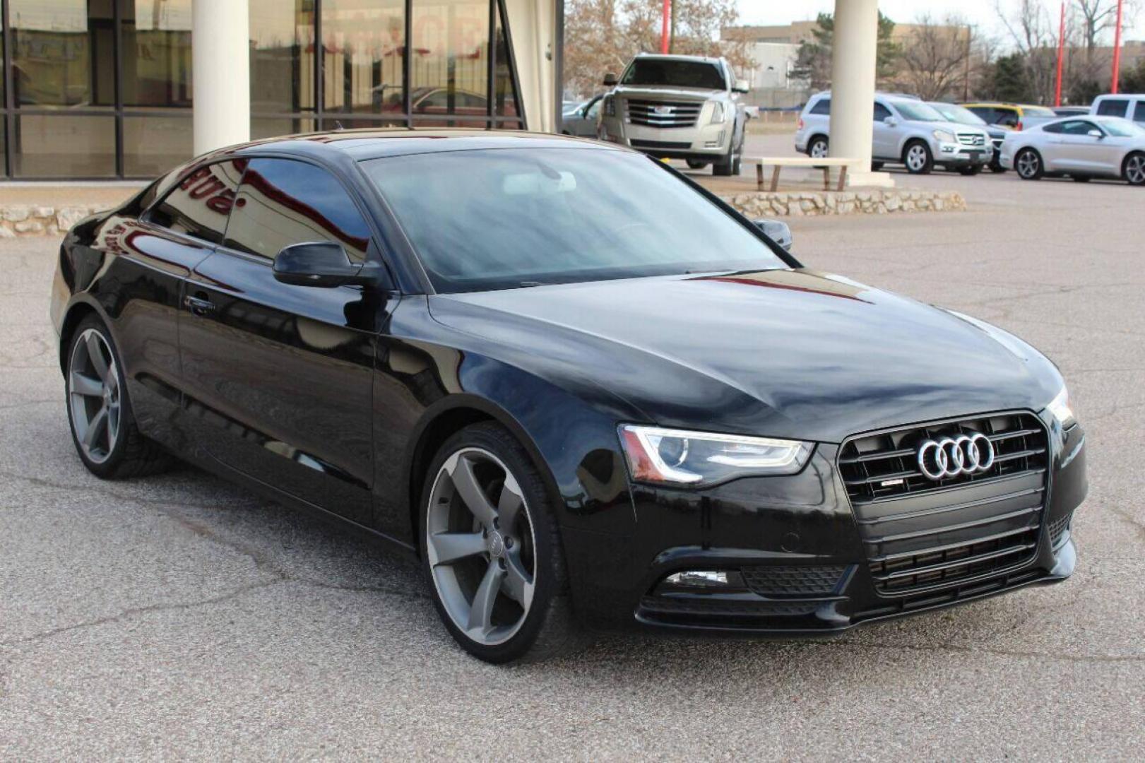 2014 Black Audi A5 Coupe 2.0T quattro Tiptronic (WAULFAFR0EA) with an 2.0L I4 Turbocharger 2.0L I4 engine, Automatic 8-Speed transmission, located at 4301 NW 39th , Oklahoma City, OK, 73112, (405) 949-5600, 35.512135, -97.598671 - NO DRIVERS LICENCE NO-FULL COVERAGE INSURANCE-NO CREDIT CHECK. COME ON OVER TO SUPERSPORTS AND TAKE A LOOK AND TEST DRIVE PLEASE GIVE US A CALL AT (405) 949-5600. NO LICENSIA DE MANEJAR- NO SEGURO DE COBERTURA TOTAL- NO VERIFICACCION DE CREDITO. POR FAVOR VENGAN A SUPERSPORTS, ECHE UN VIS - Photo#2